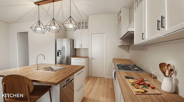 a kitchen with stainless steel appliances granite countertop a sink a stove top oven a chimney and cabinets