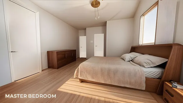 a bedroom with a bed and wooden floor