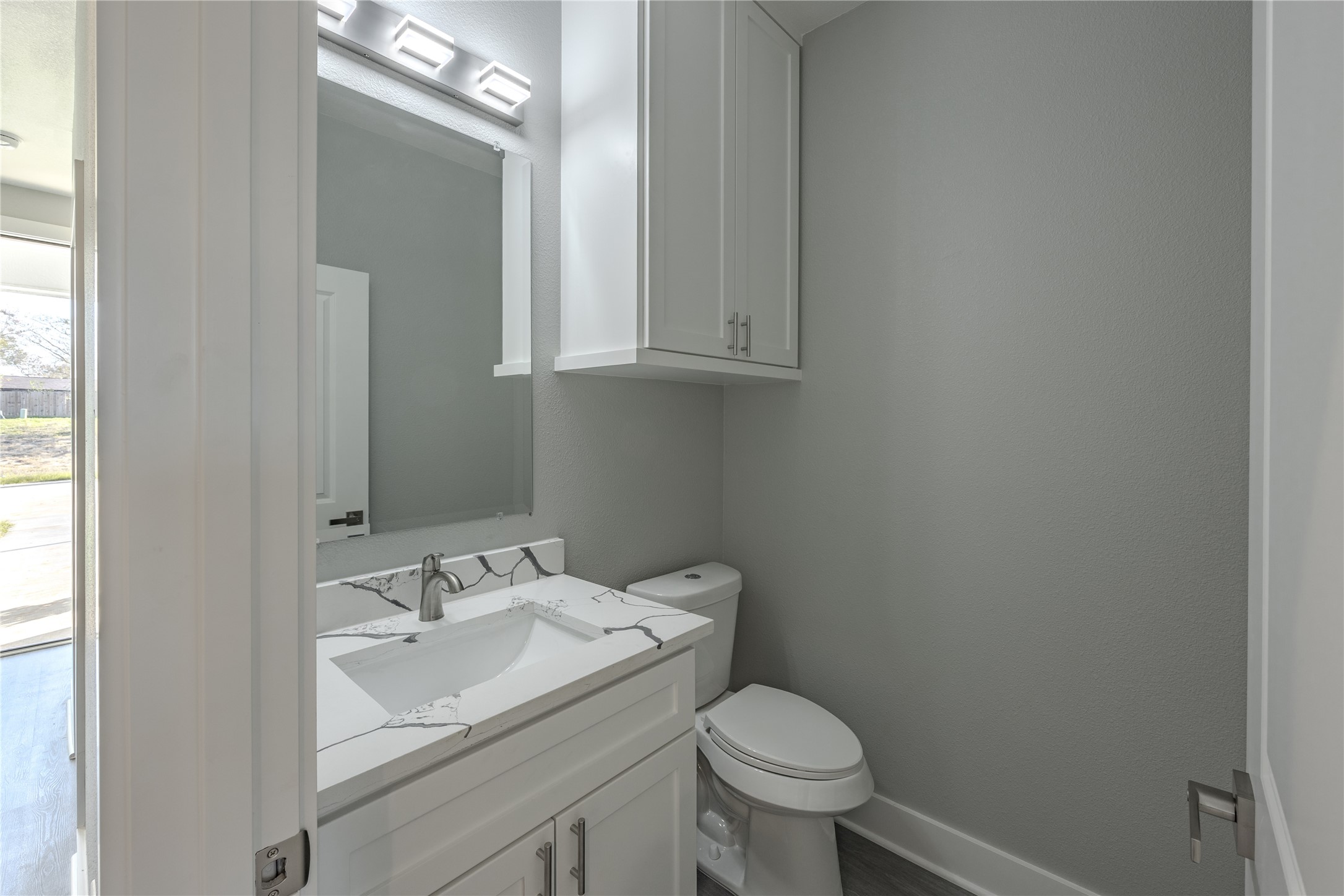 737 Ebenezer Lane Brenham, TX 77833 - Photo 7 of 25 a bathroom with a sink and a toilet