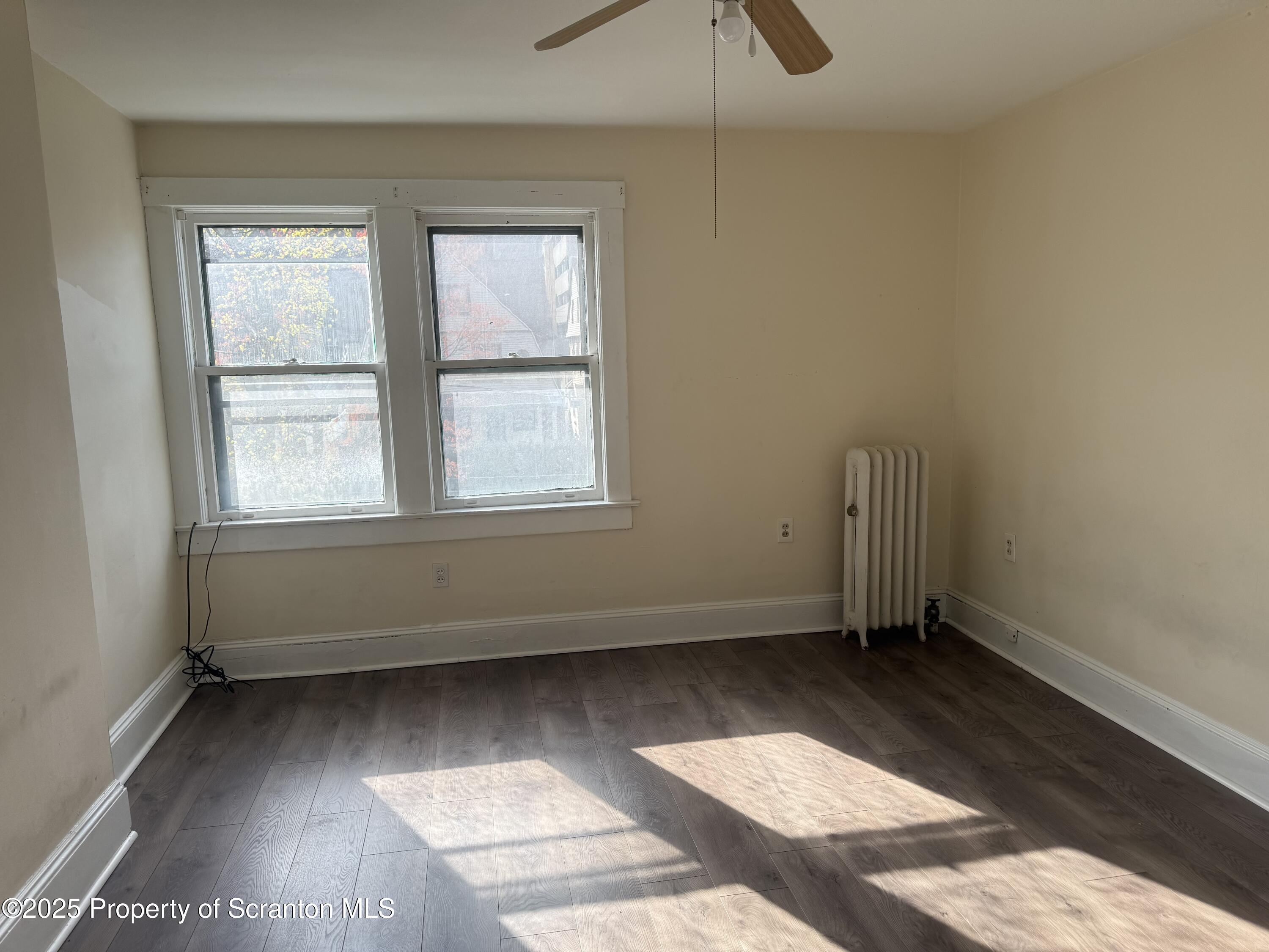 315 Wheeler Avenue Scranton, PA 18510 - Photo 12 of 18 an empty room with windows