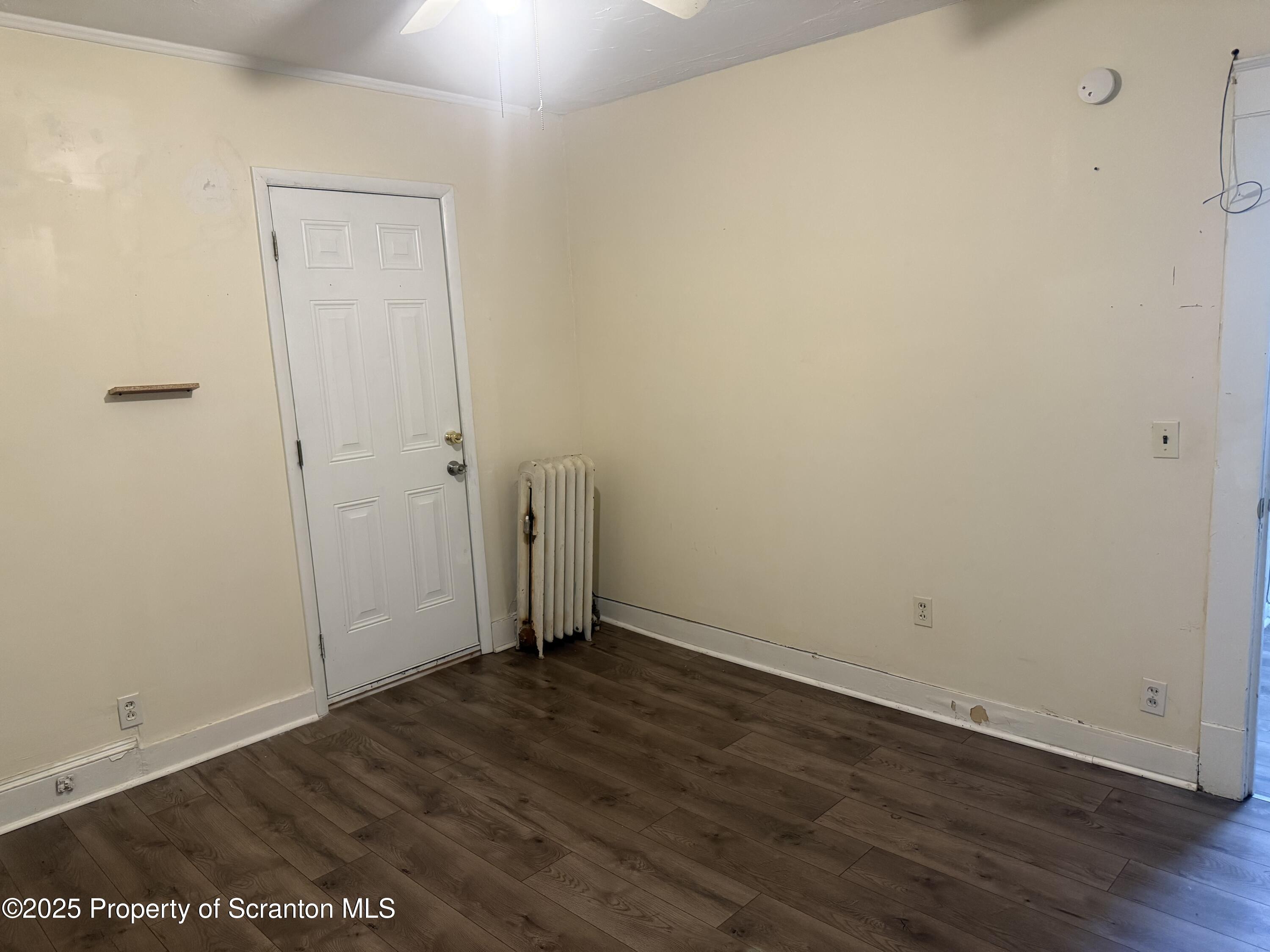 315 Wheeler Avenue Scranton, PA 18510 - Photo 13 of 18 an empty room with wooden floor
