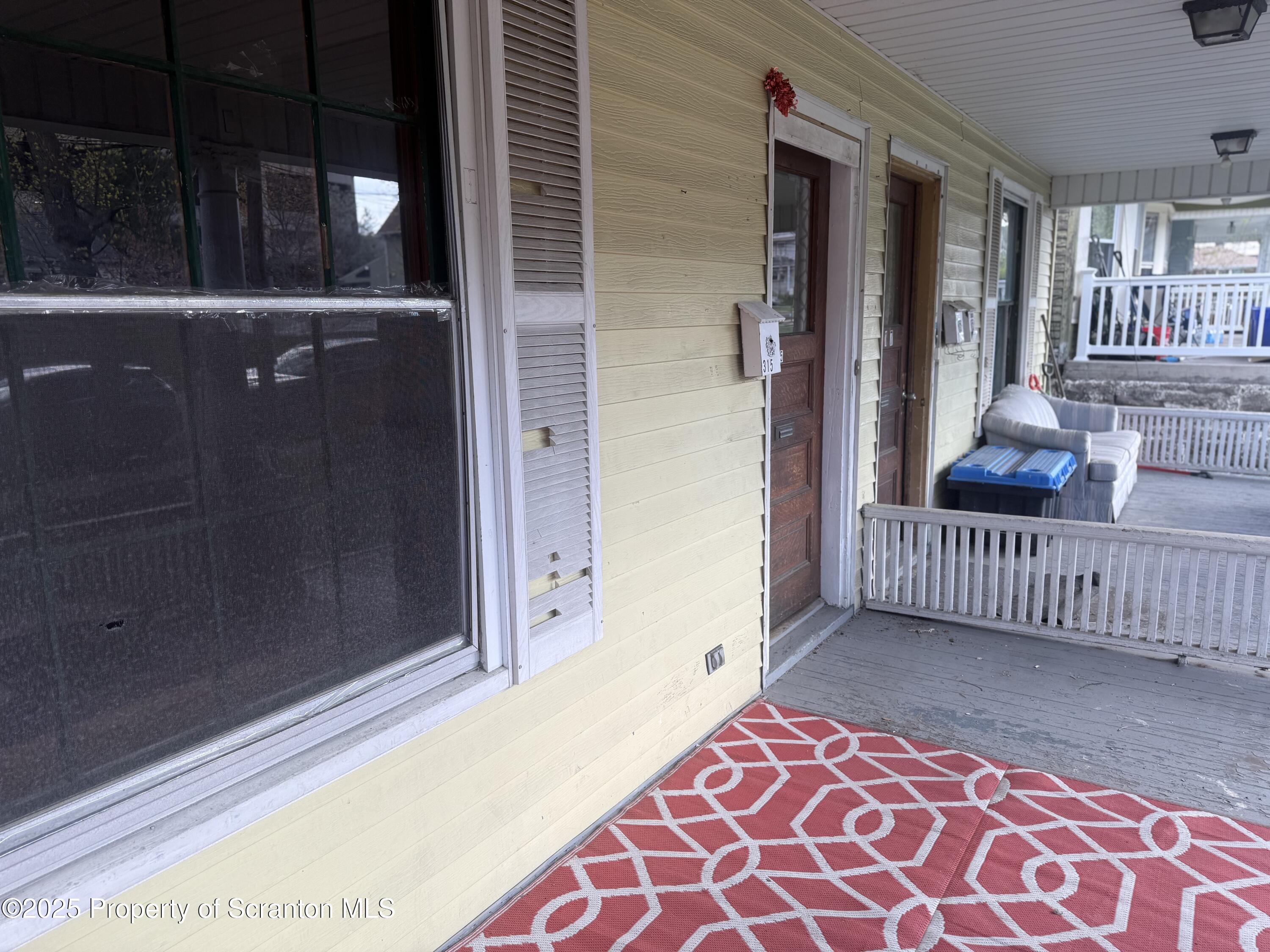 315 Wheeler Avenue Scranton, PA 18510 - Photo 2 of 18 a bedroom with windows