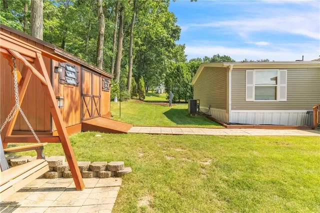 a view of swimming pool with a garden