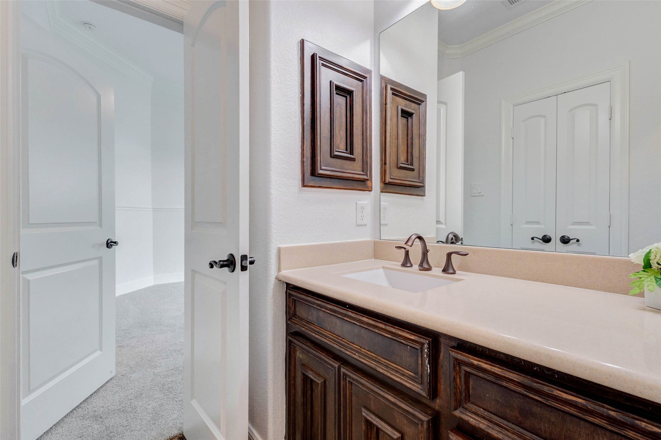5327 Whitmore Fulshear, TX 77441 - Photo 33 of 50 This private vanity area provides convenient access and ample storage while maintaining a cohesive design throughout the home.