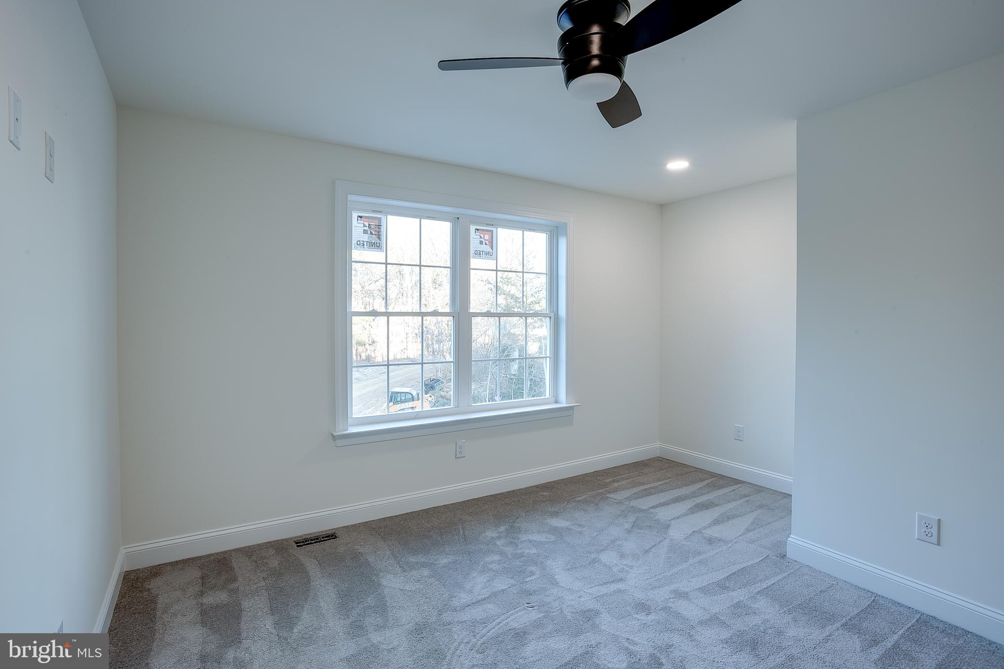 1427 Williamstown Erial Road Sicklerville, NJ 08081 - Photo 22 of 27 an empty room with a window