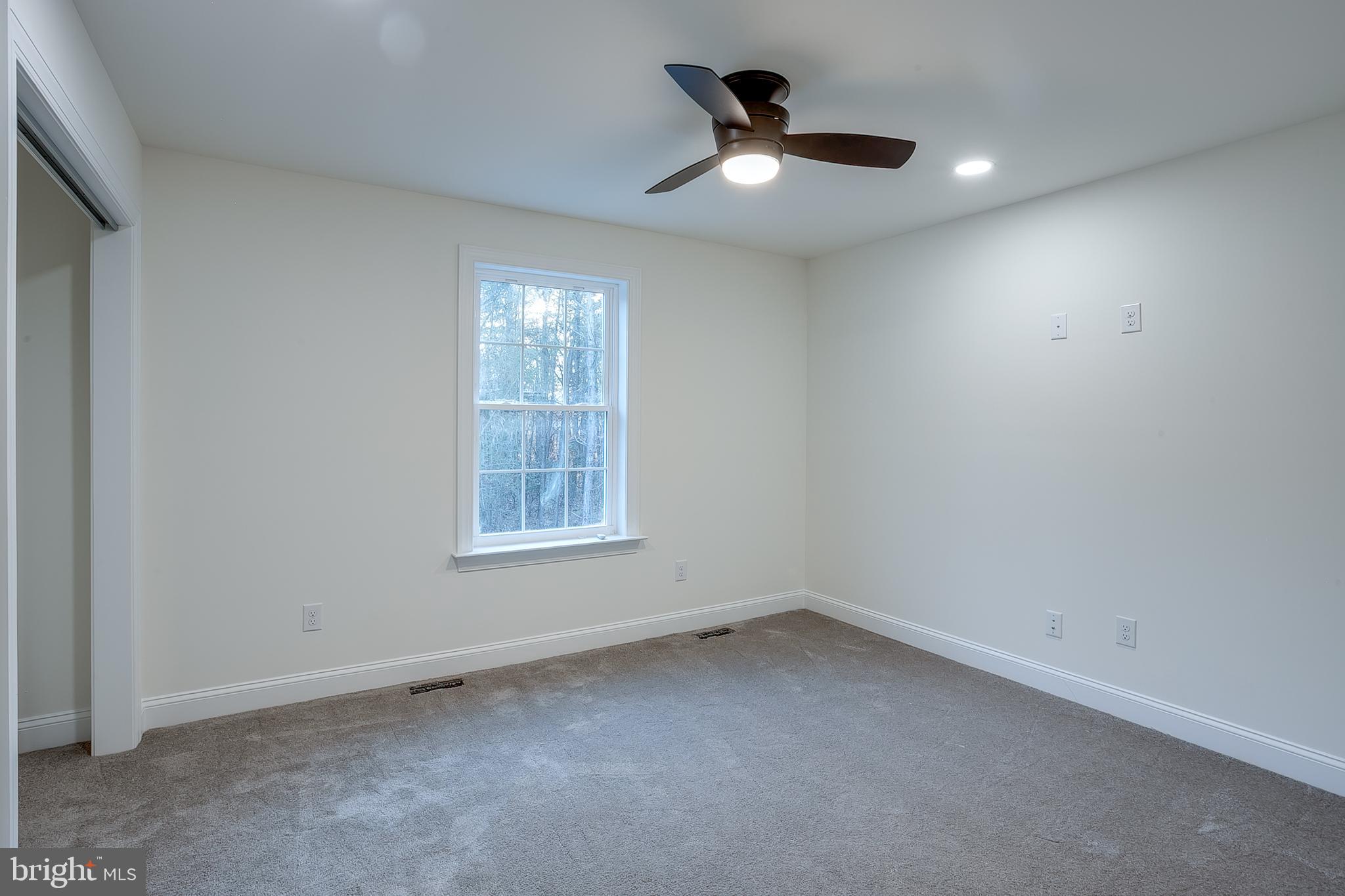 1427 Williamstown Erial Road Sicklerville, NJ 08081 - Photo 23 of 27 an empty room with a window