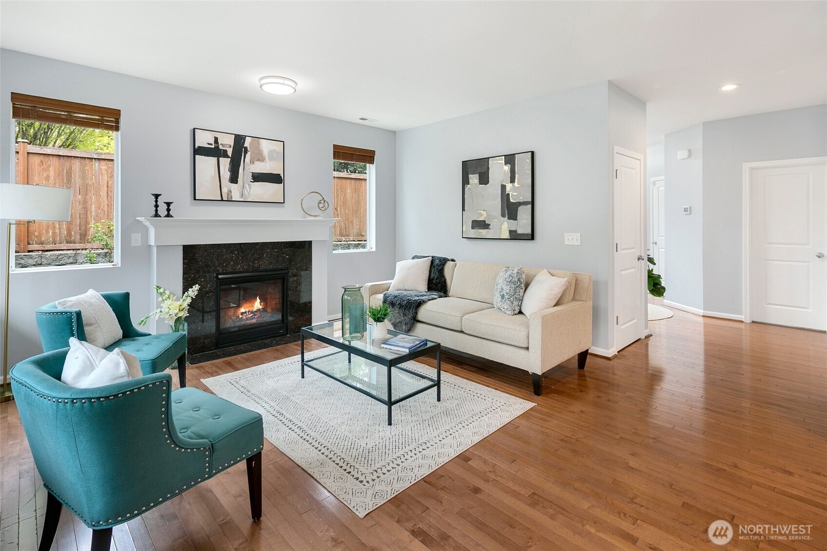 3931 177th Street Southeast Bothell, WA 98012 - Photo 14 of 39 a living room with furniture and a fireplace