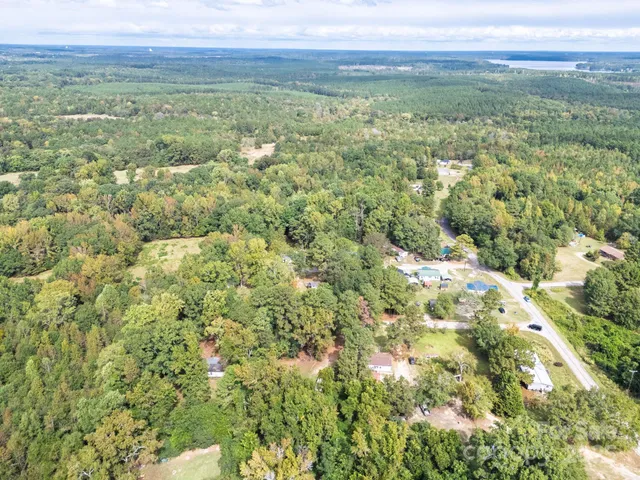 a view of an outdoor space with a lake view and mountain view