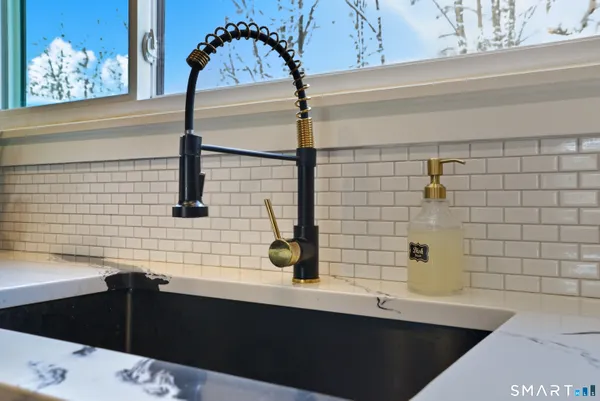 a bathroom with a sink and a bathtub