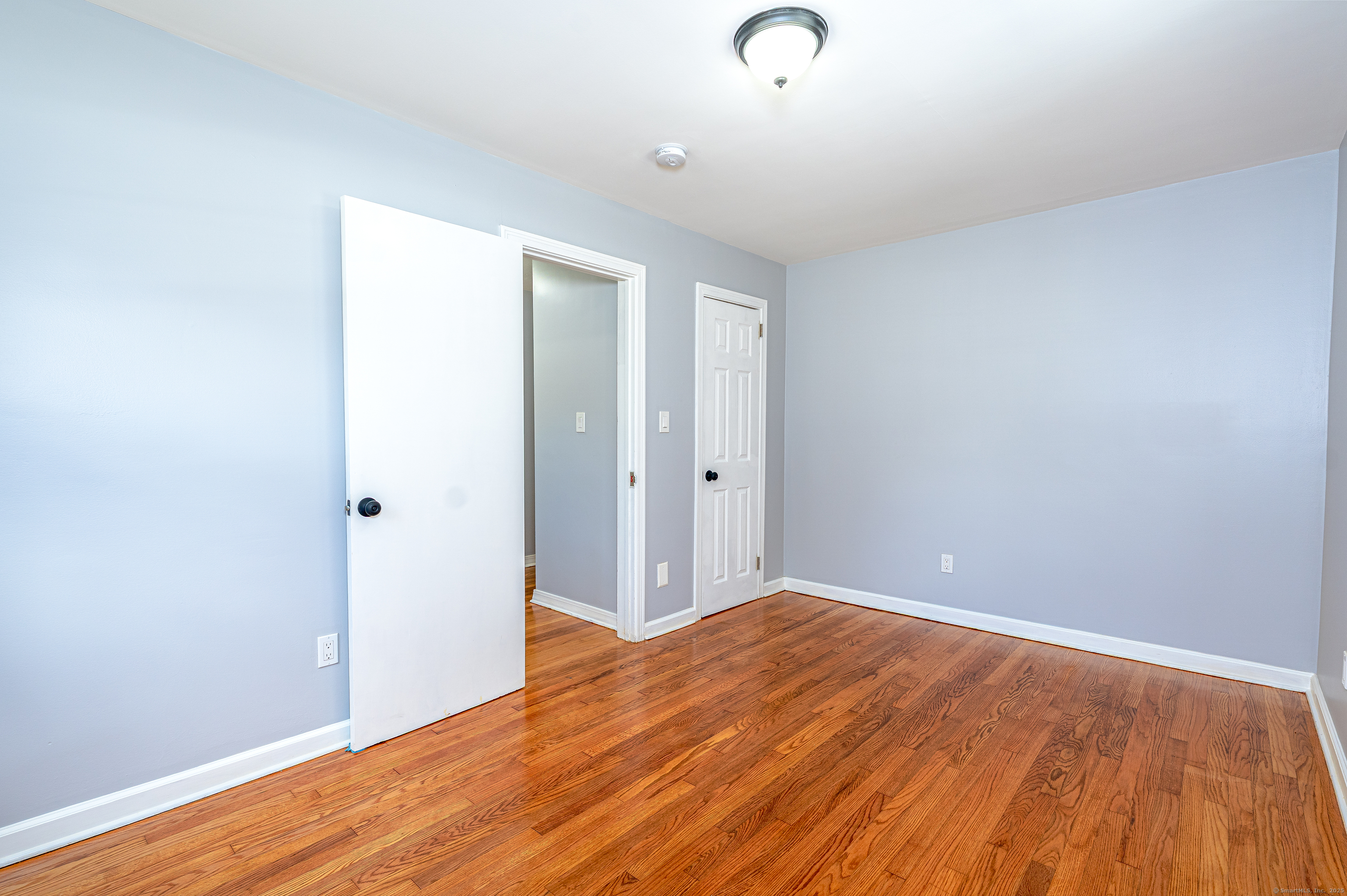 8 Ranslow Drive Wolcott, CT 06716 - Photo 15 of 31 a view of room with wooden floor