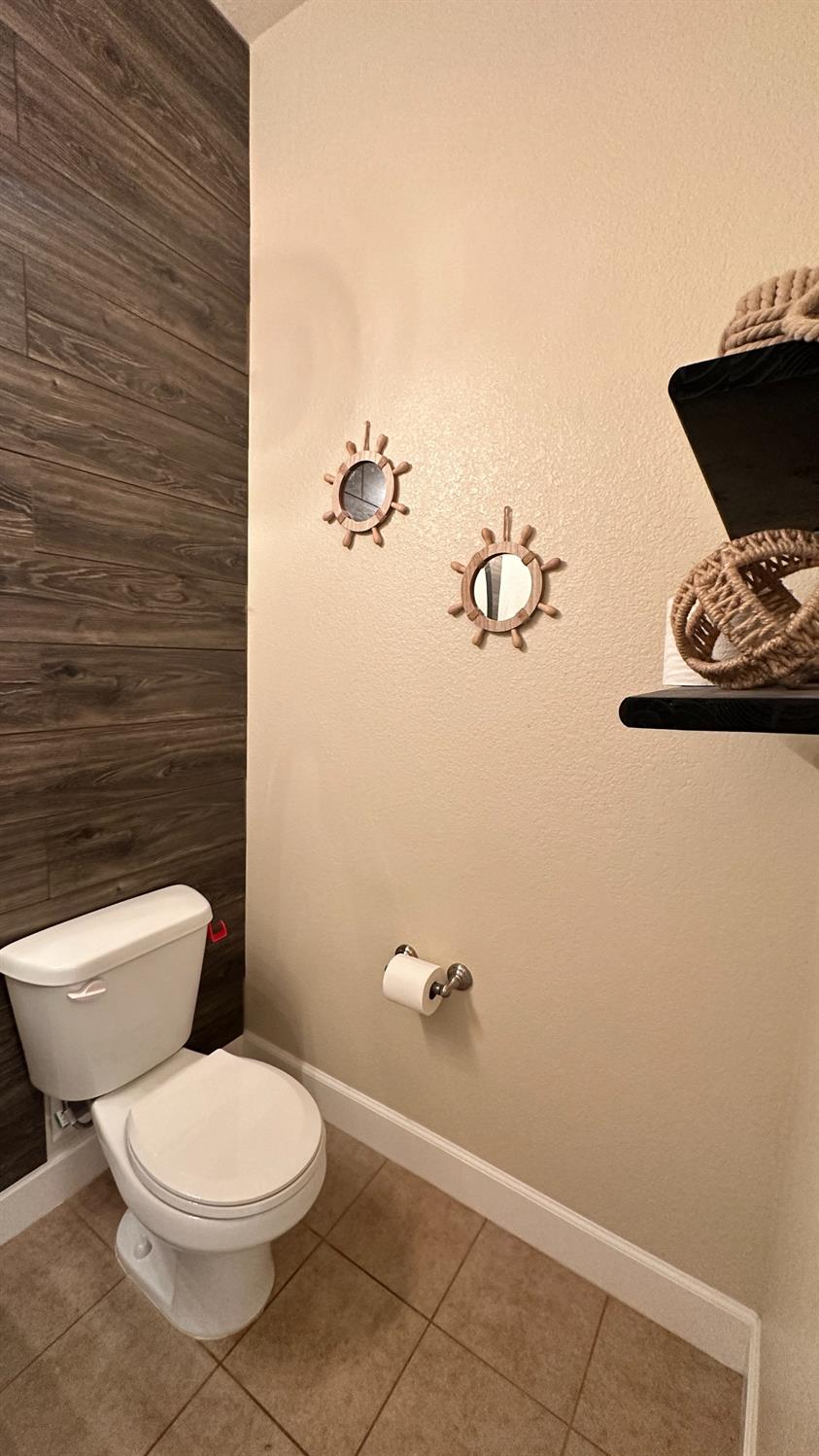 1040 Birch Run Way Manteca, CA 95336 - Photo 25 of 52 a bathroom with a toilet and a shower