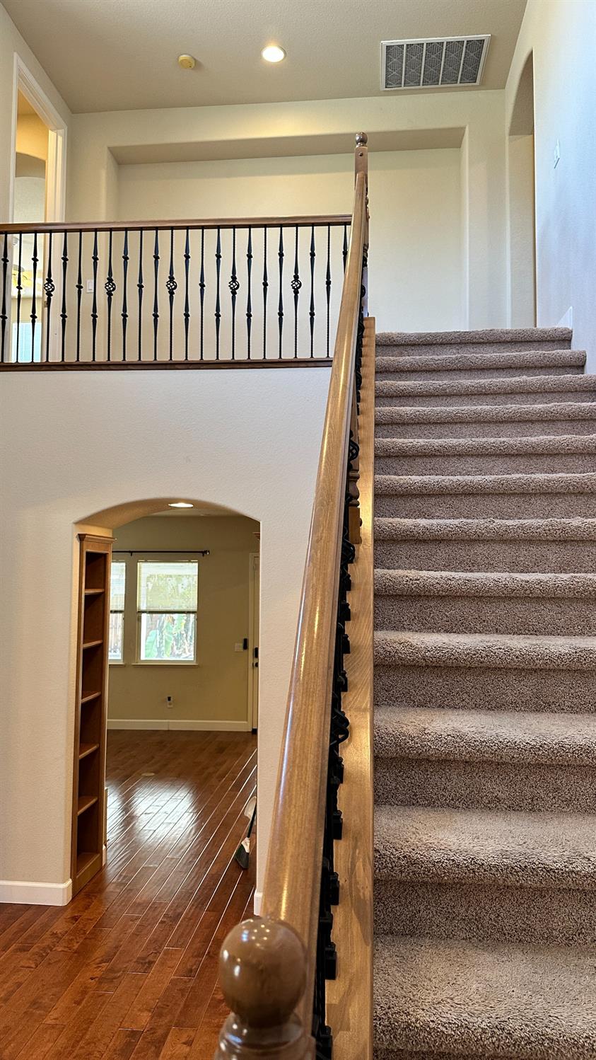 1040 Birch Run Way Manteca, CA 95336 - Photo 27 of 52 a view of entryway and hall with wooden floor