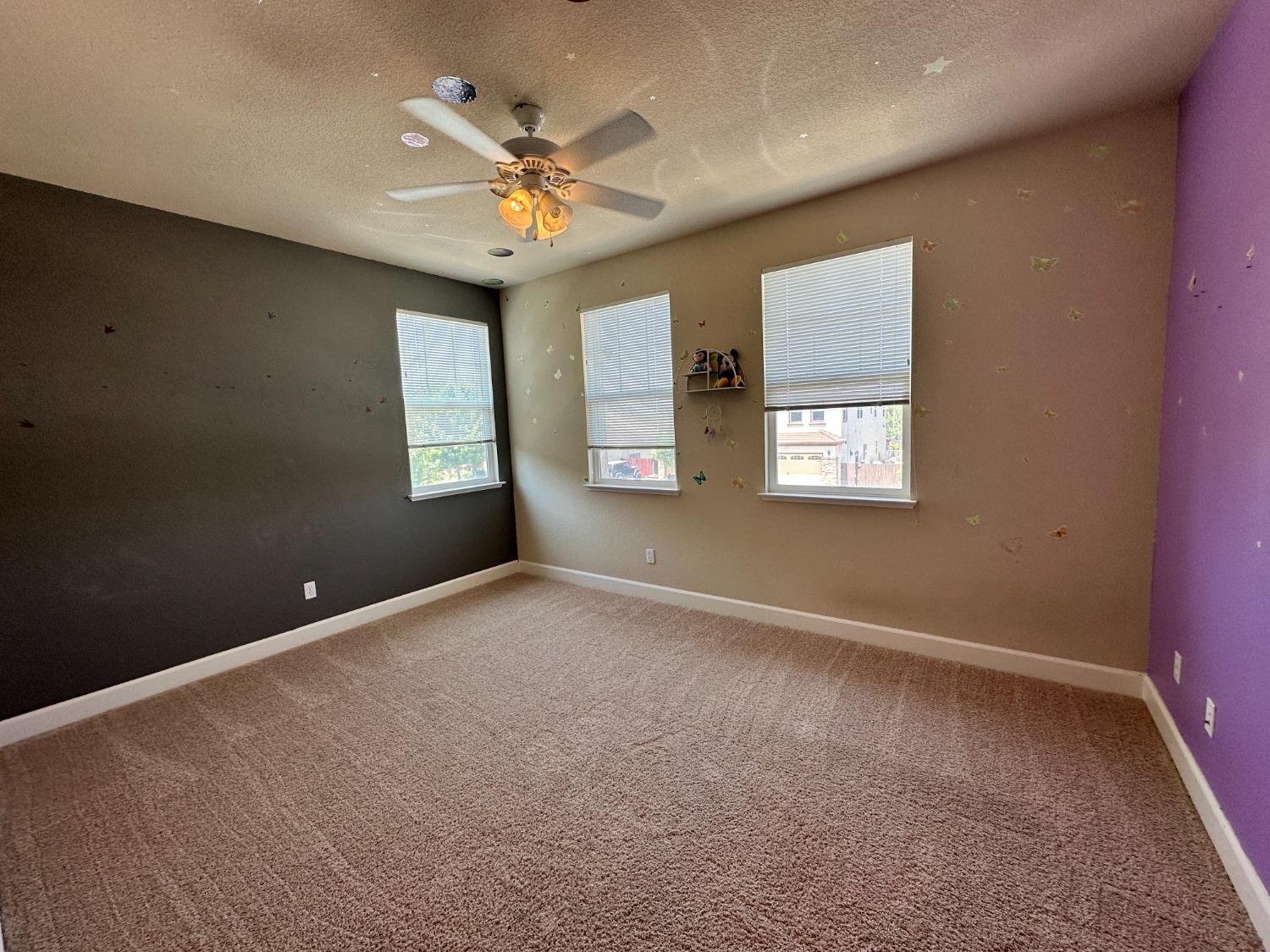 1040 Birch Run Way Manteca, CA 95336 - Photo 33 of 52 a view of an empty room with a window