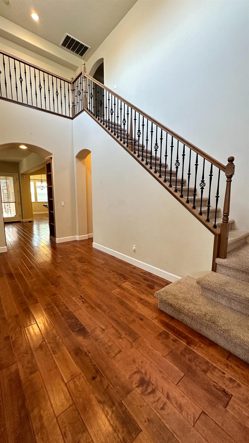 1040 Birch Run Way Manteca, CA 95336 - Photo 4 of 52 a view of entryway hall and hall with wooden floor