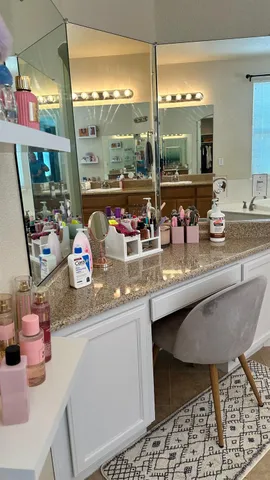 a kitchen with a sink and a stove top oven