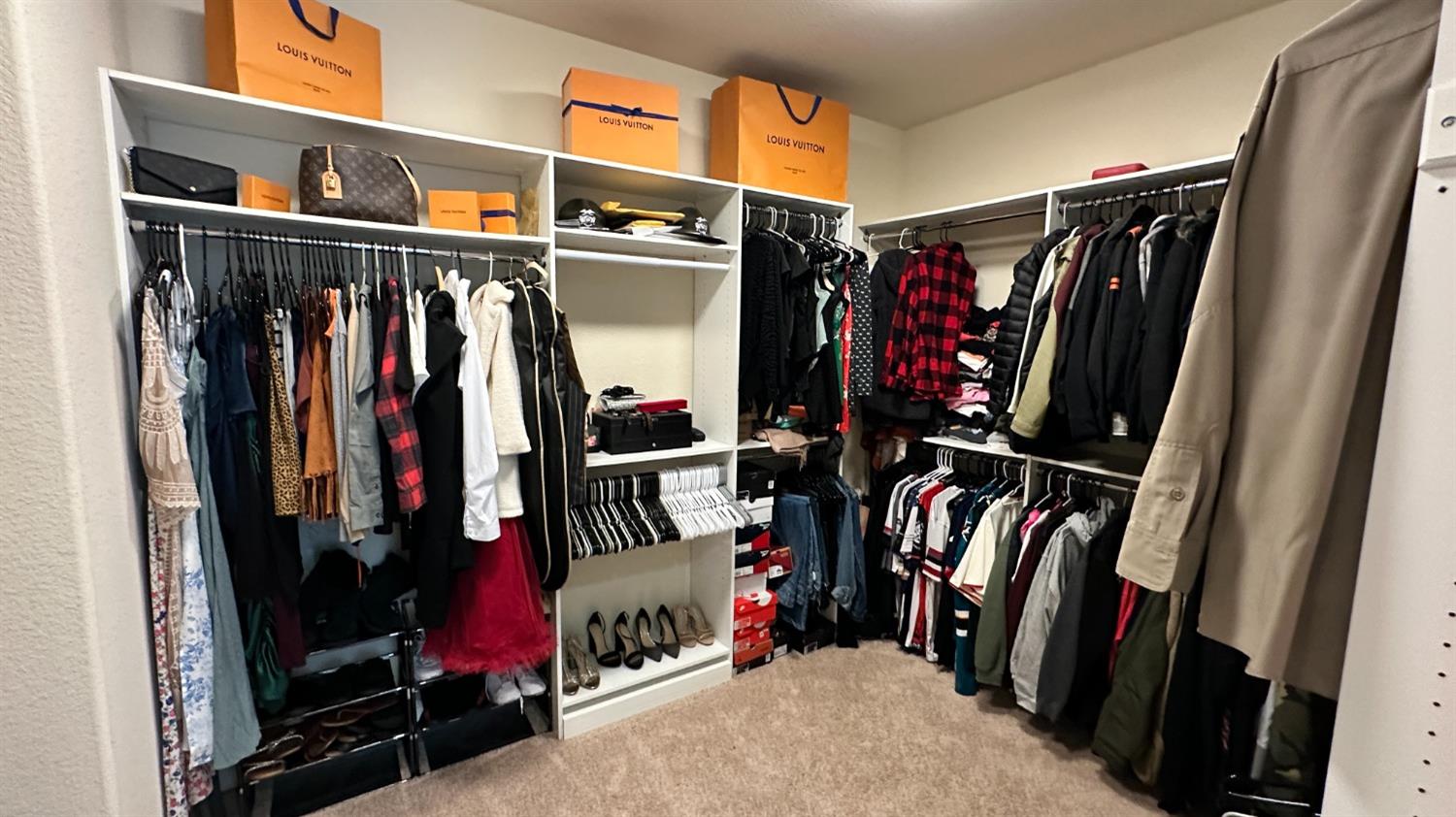 1040 Birch Run Way Manteca, CA 95336 - Photo 46 of 52 a view of walk in closet with clothes