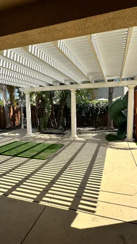 a view of a backyard with a house