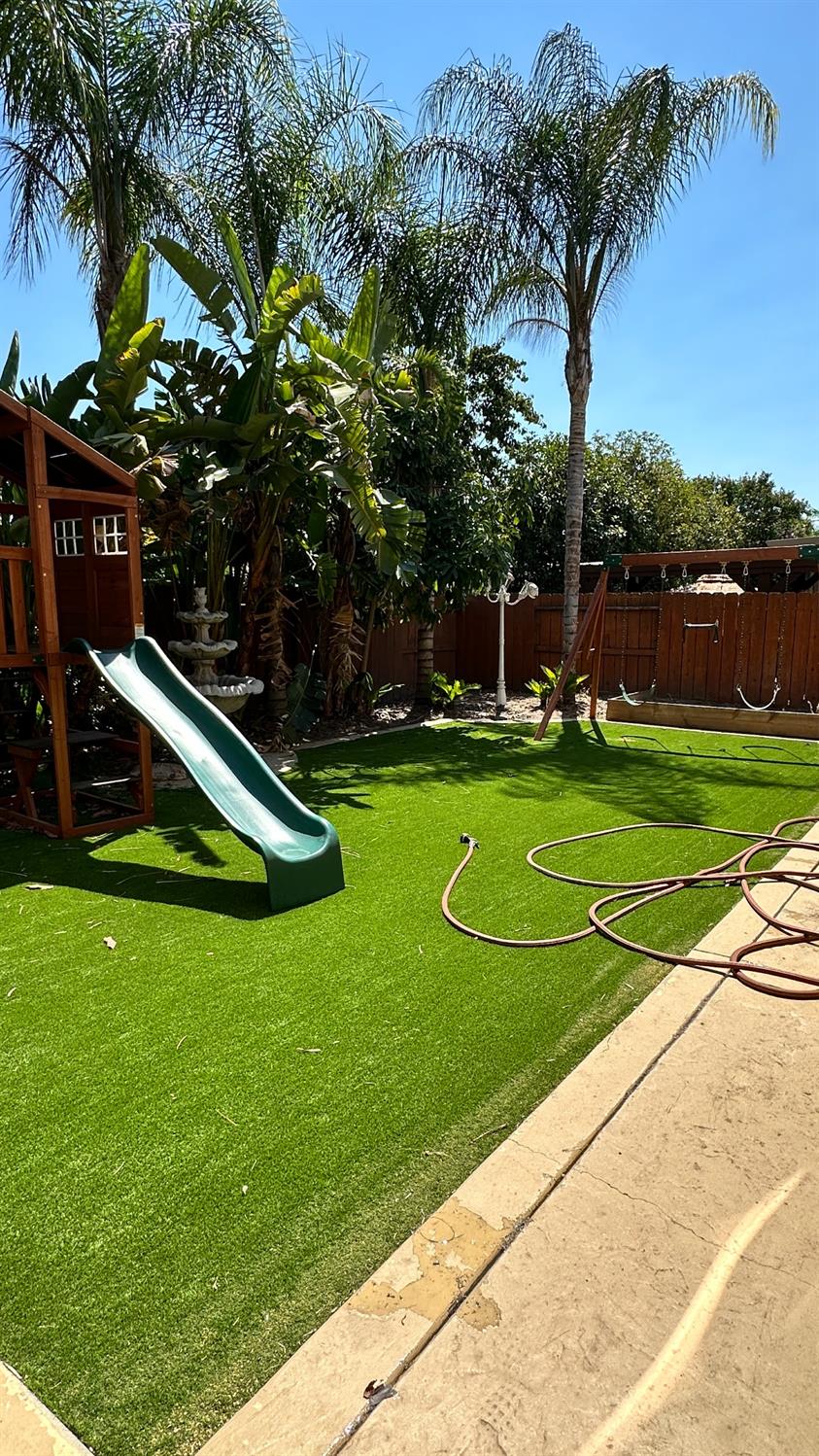 1040 Birch Run Way Manteca, CA 95336 - Photo 50 of 52 a view of a park with palm trees