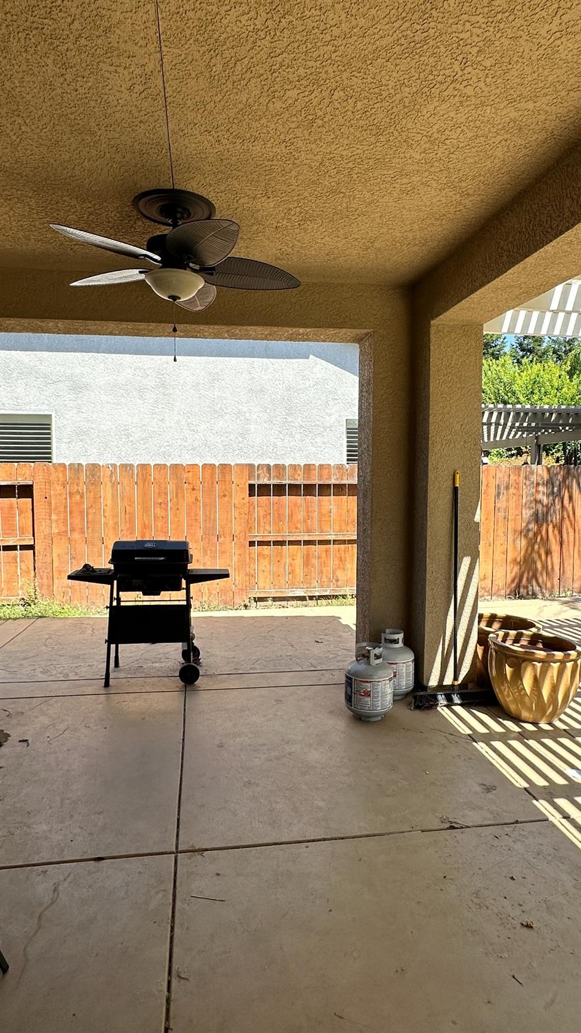 1040 Birch Run Way Manteca, CA 95336 - Photo 52 of 52 a room with gym equipment and a large window