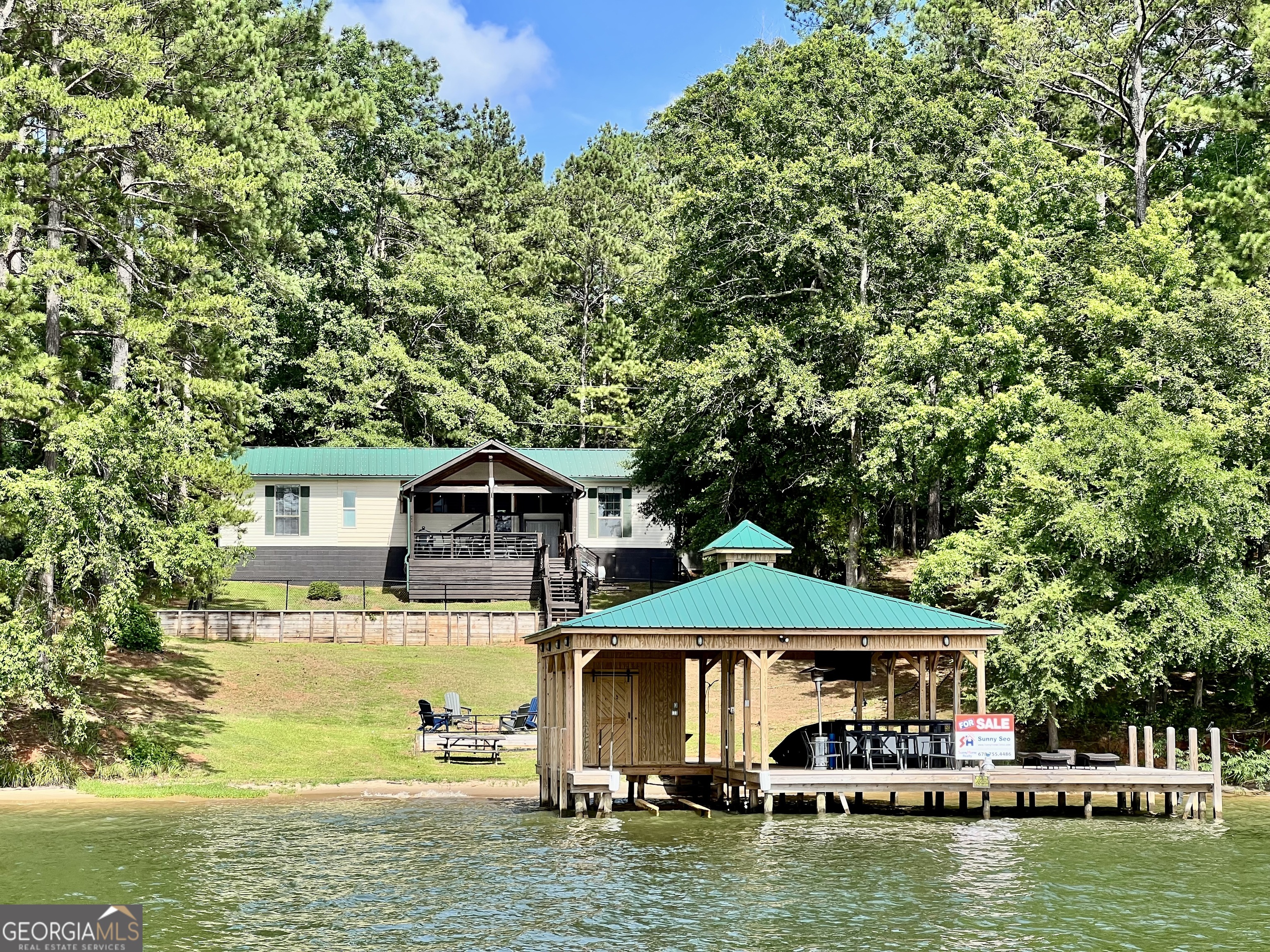 a front view of a house with a boat
