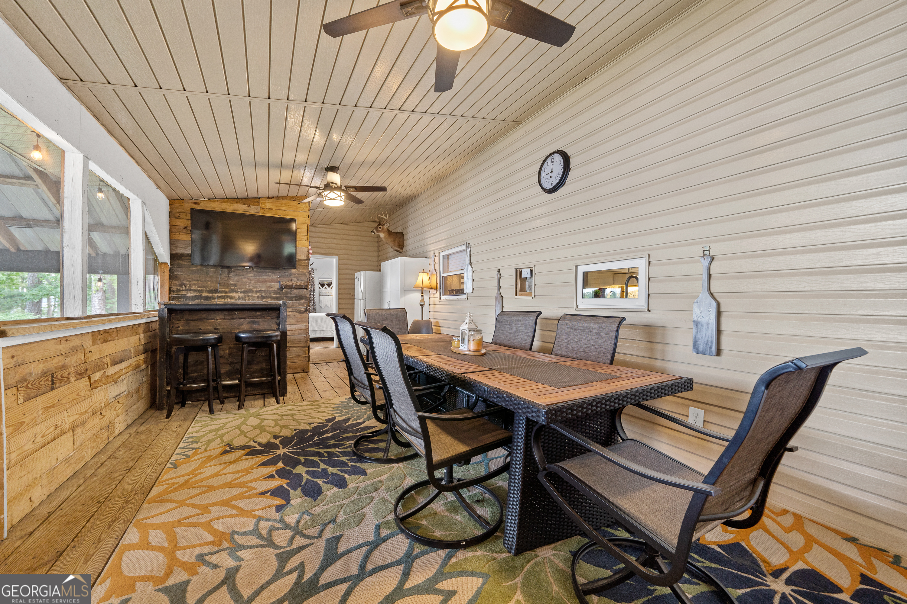 321 Barbara Point Road Sparta, GA 31087 - Photo 28 of 55 a dining room with furniture and window