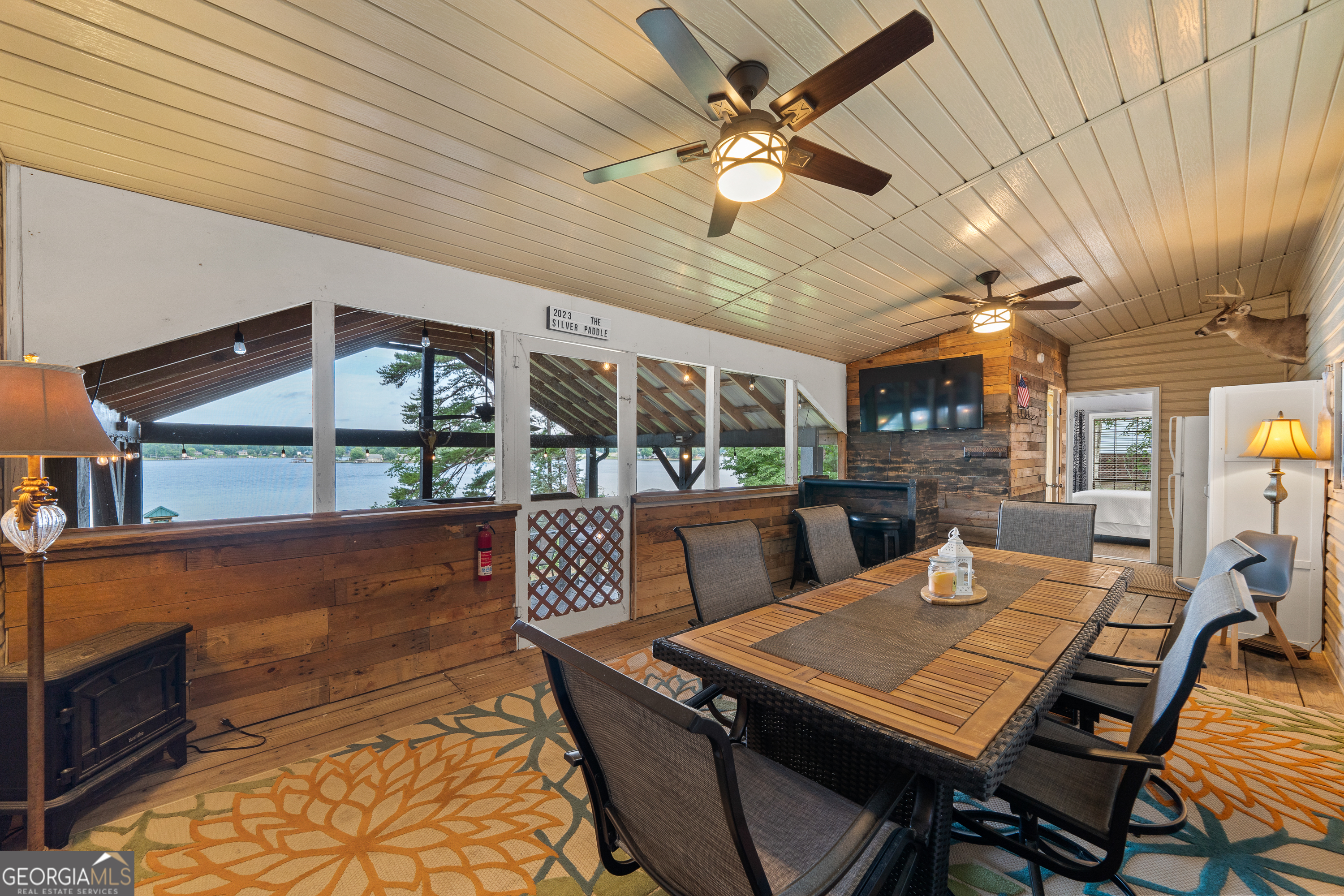 321 Barbara Point Road Sparta, GA 31087 - Photo 29 of 55 a view of a dining room with furniture
