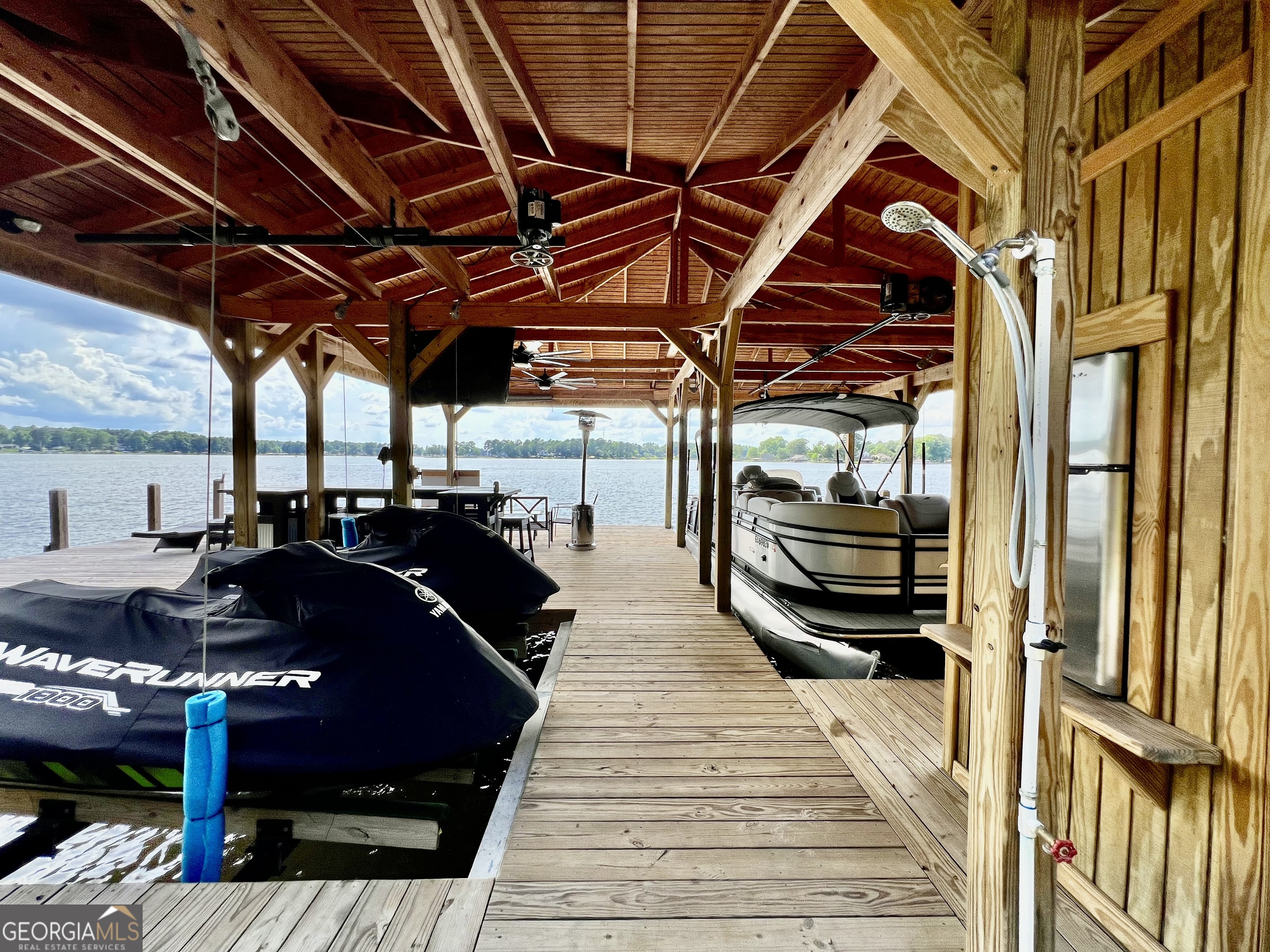 321 Barbara Point Road Sparta, GA 31087 - Photo 40 of 55 a view of balcony with wooden floor
