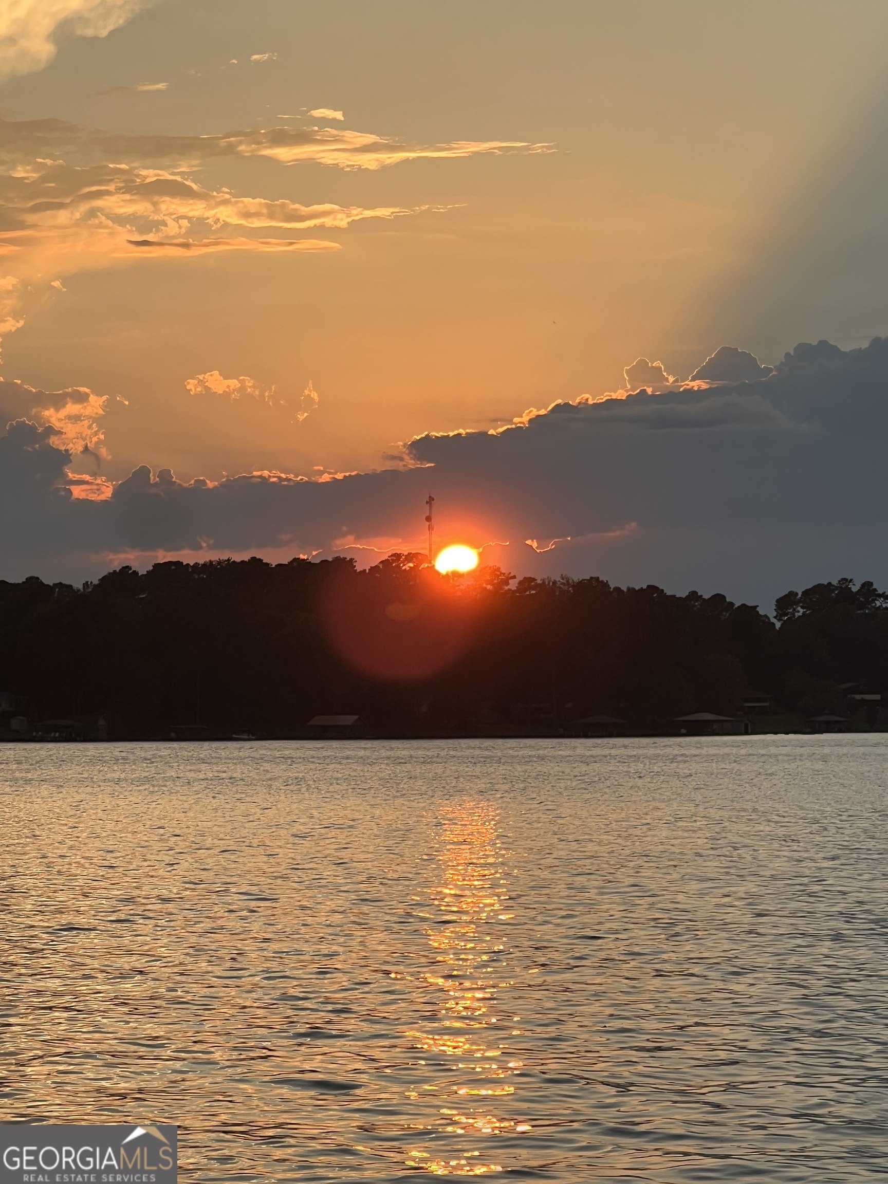 321 Barbara Point Road Sparta, GA 31087 - Photo 52 of 55 a view of ocean with sunset