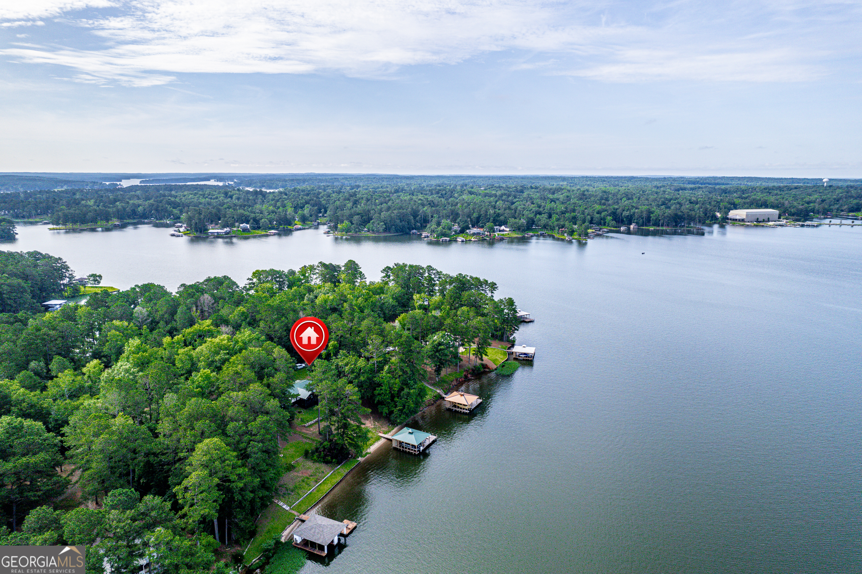 321 Barbara Point Road Sparta, GA 31087 - Photo 55 of 55 an aerial view of a house with lake view
