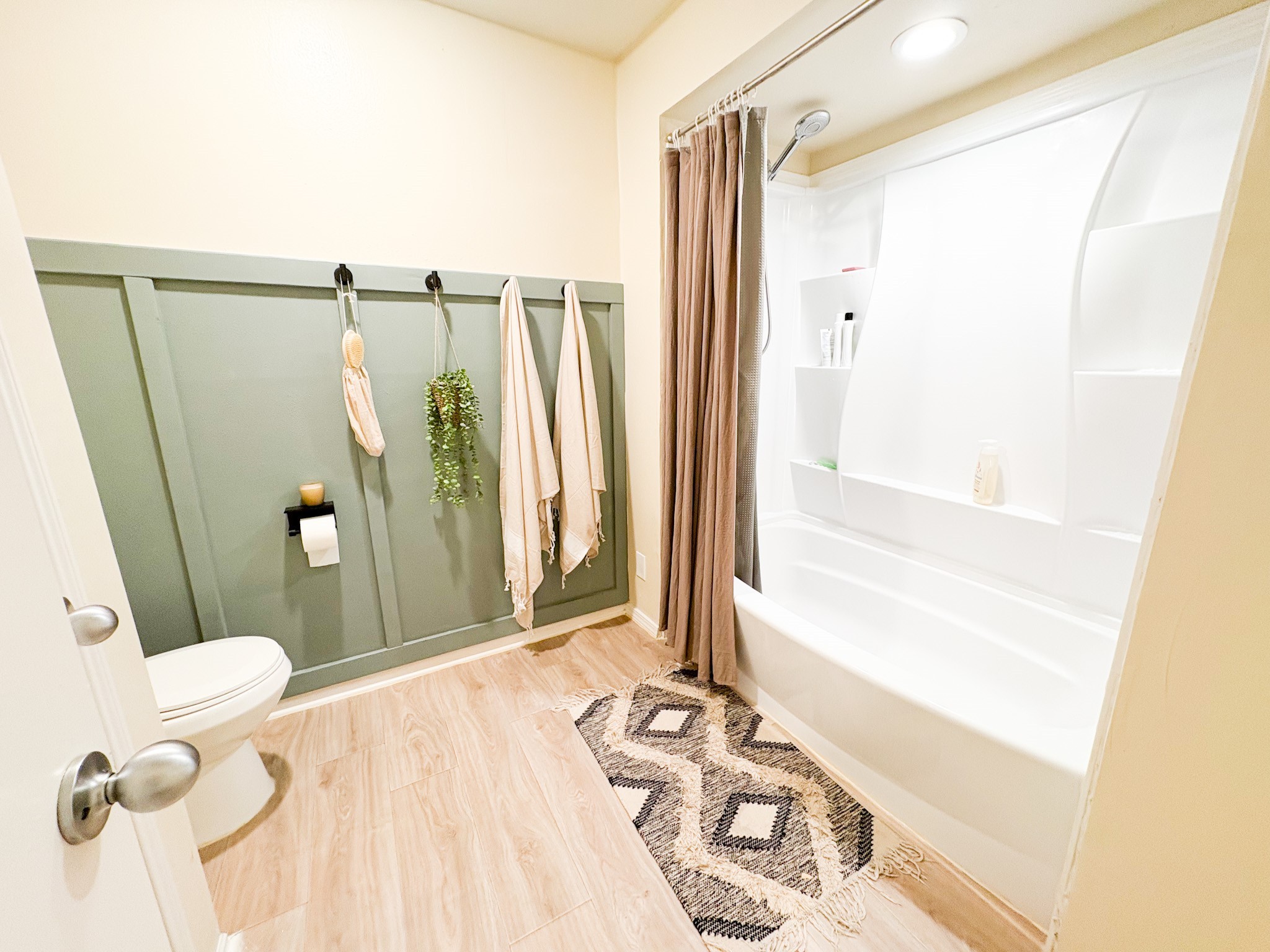 738 Thicket Lane Houston, TX 77079 - Photo 13 of 20 a view of a bedroom with wooden floor and bathroom
