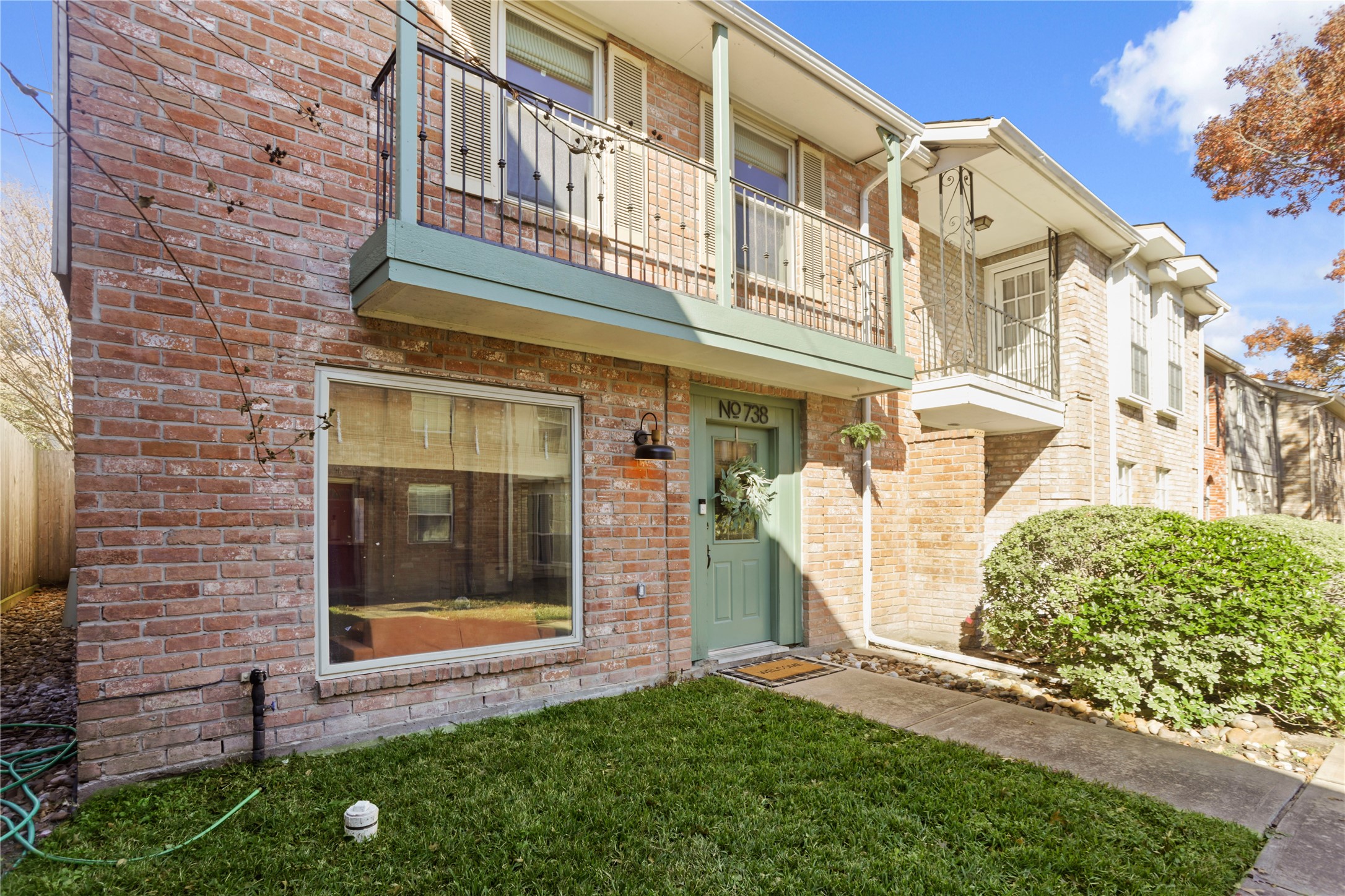 738 Thicket Lane Houston, TX 77079 - Photo 19 of 20 a view of a building with a door