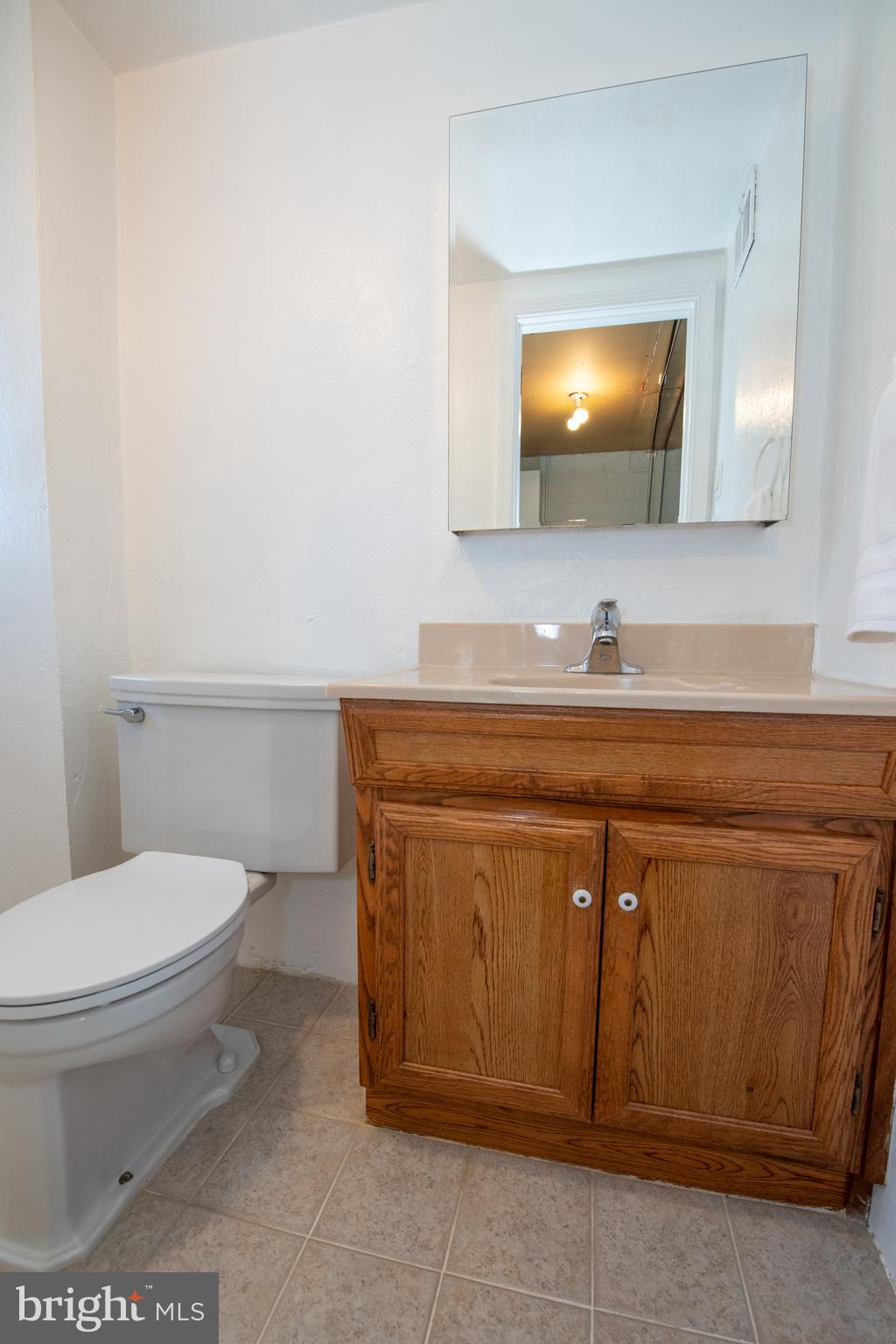 1836 Watson Road Abington, PA 19001 - Photo 16 of 22 a bathroom with a sink a toilet and mirror