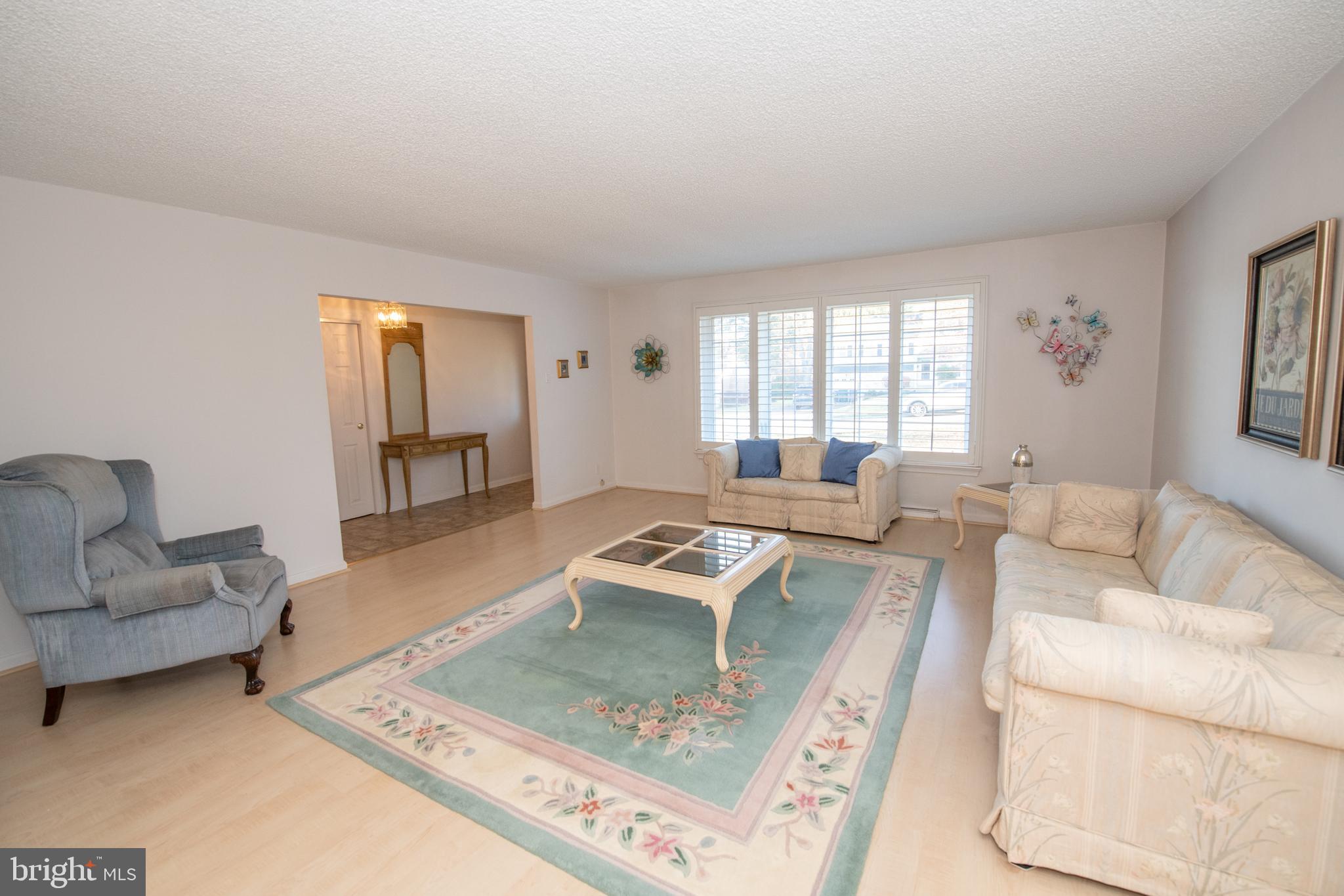 1836 Watson Road Abington, PA 19001 - Photo 2 of 22 a living room with furniture and a couch