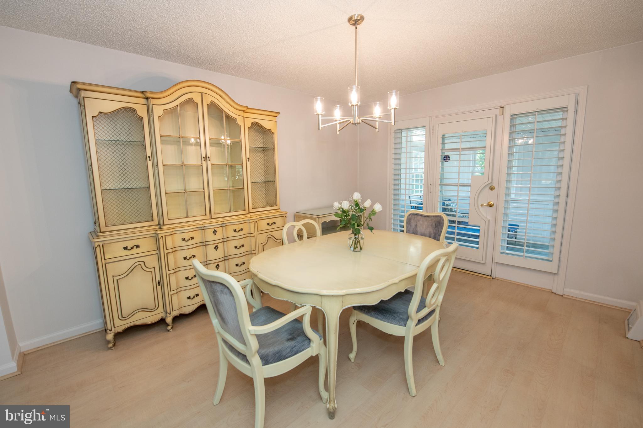 1836 Watson Road Abington, PA 19001 - Photo 4 of 22 a view of a dining room with furniture and chandelier