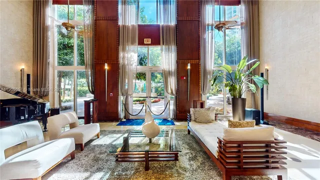 a view of a patio with dining table and chairs