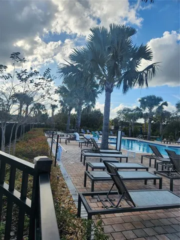 a view of a golf course with swimming pool