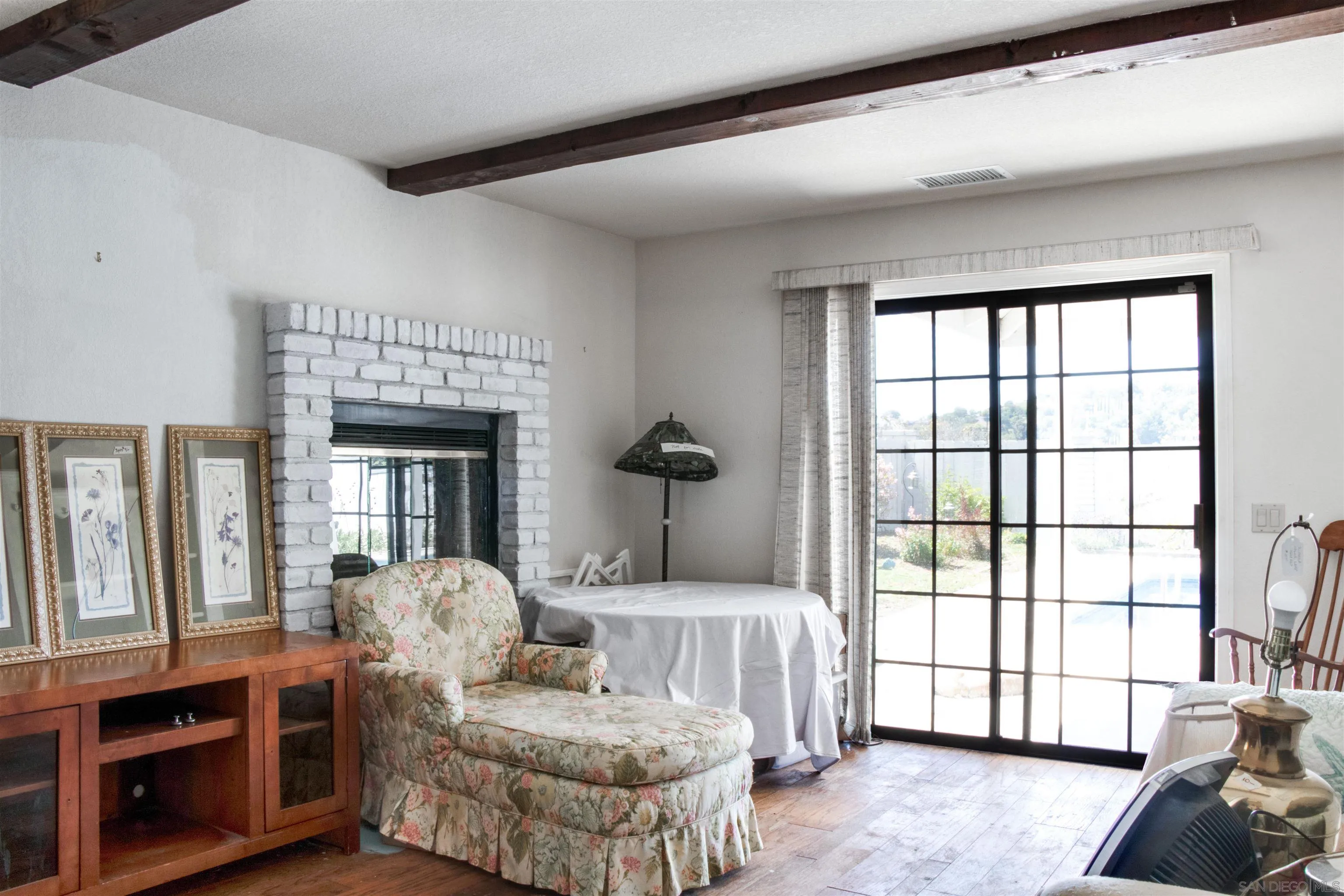 3675 Northcliff Drive Fallbrook, CA 92028 - Photo 11 of 37 a bedroom with furniture and a large window