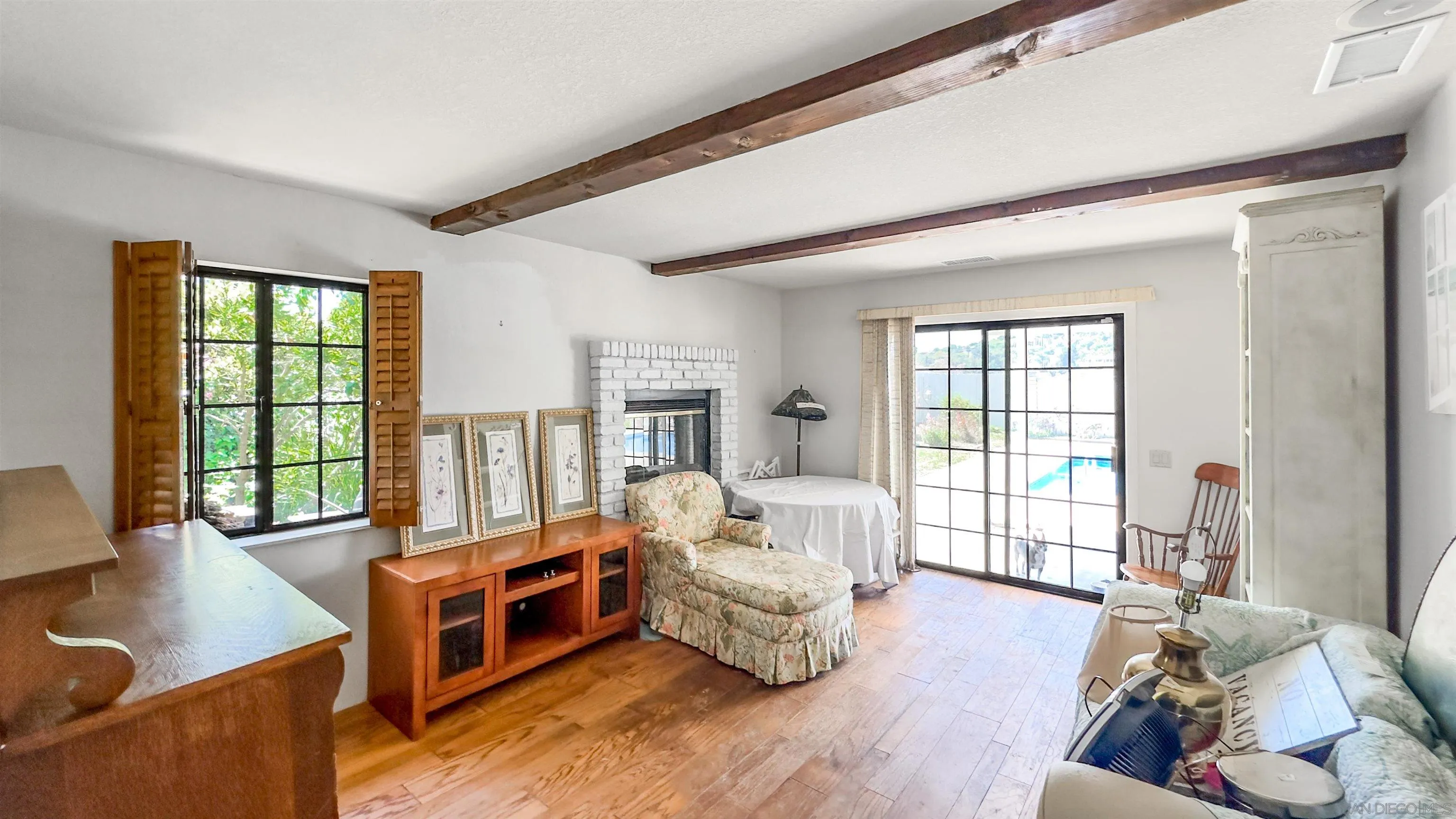 3675 Northcliff Drive Fallbrook, CA 92028 - Photo 12 of 37 a bedroom with furniture and a large window