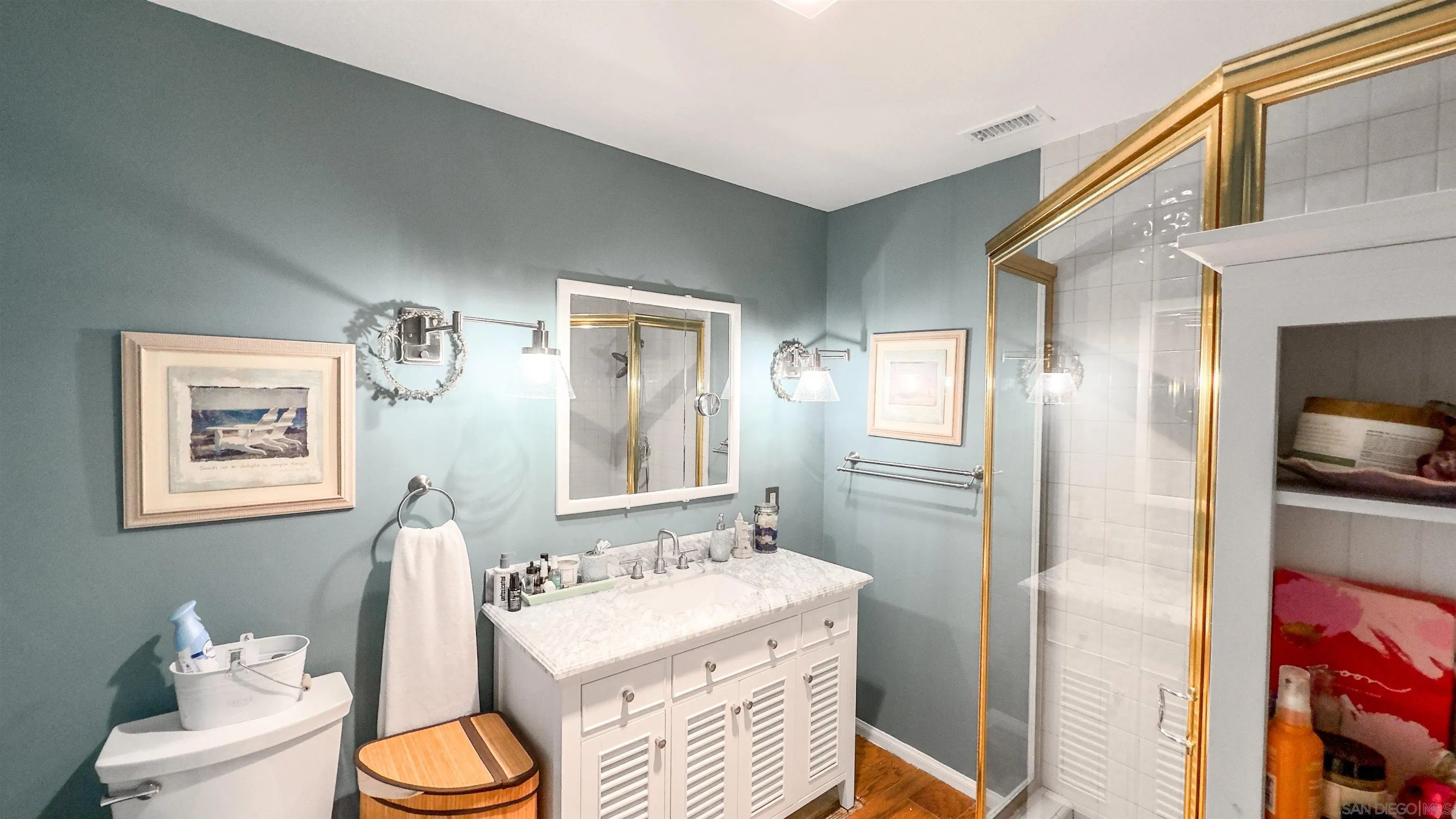 3675 Northcliff Drive Fallbrook, CA 92028 - Photo 27 of 37 a bathroom with a sink vanity mirror and toilet