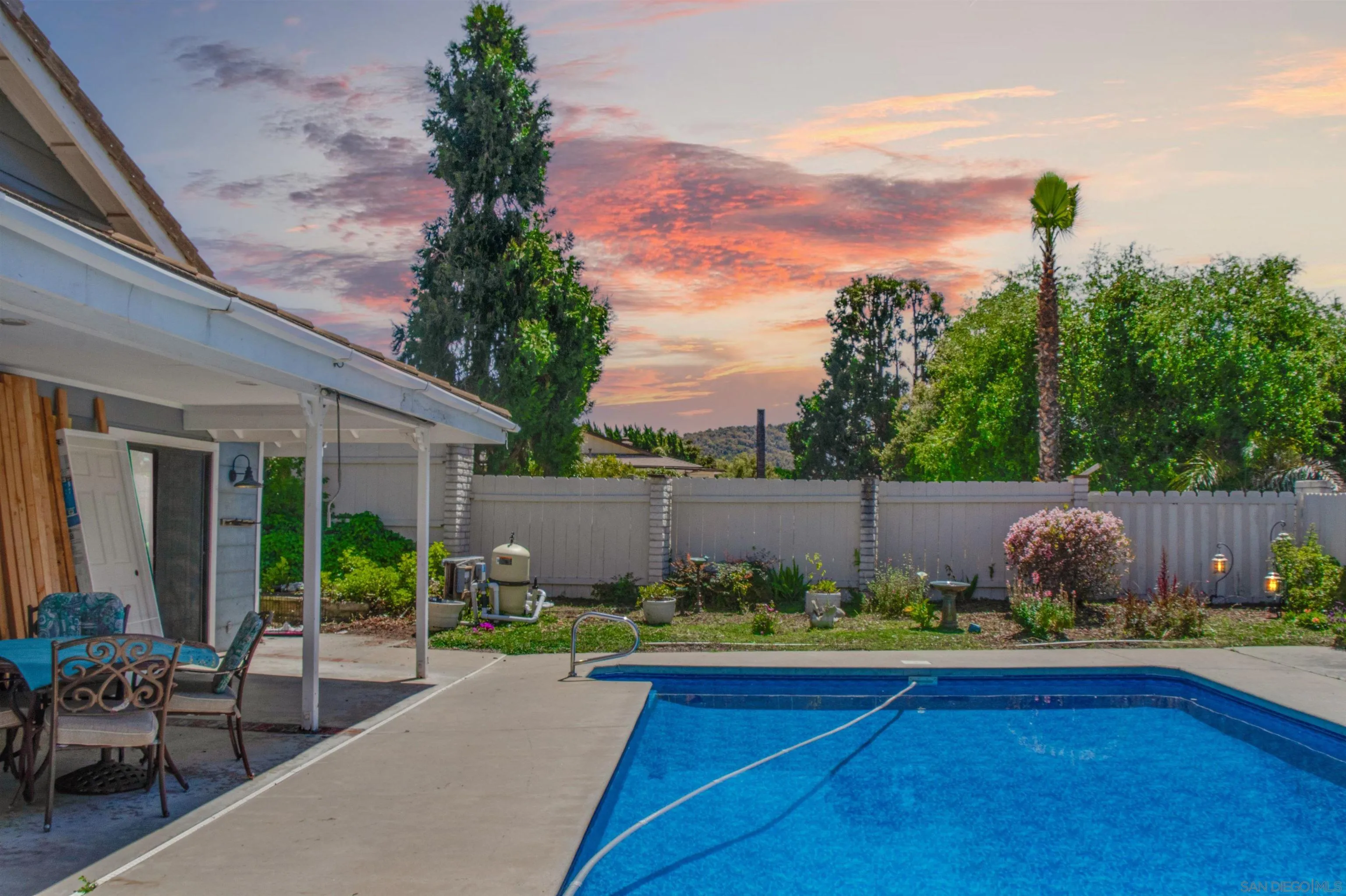 3675 Northcliff Drive Fallbrook, CA 92028 - Photo 32 of 37 a view of a backyard with sitting area and garden