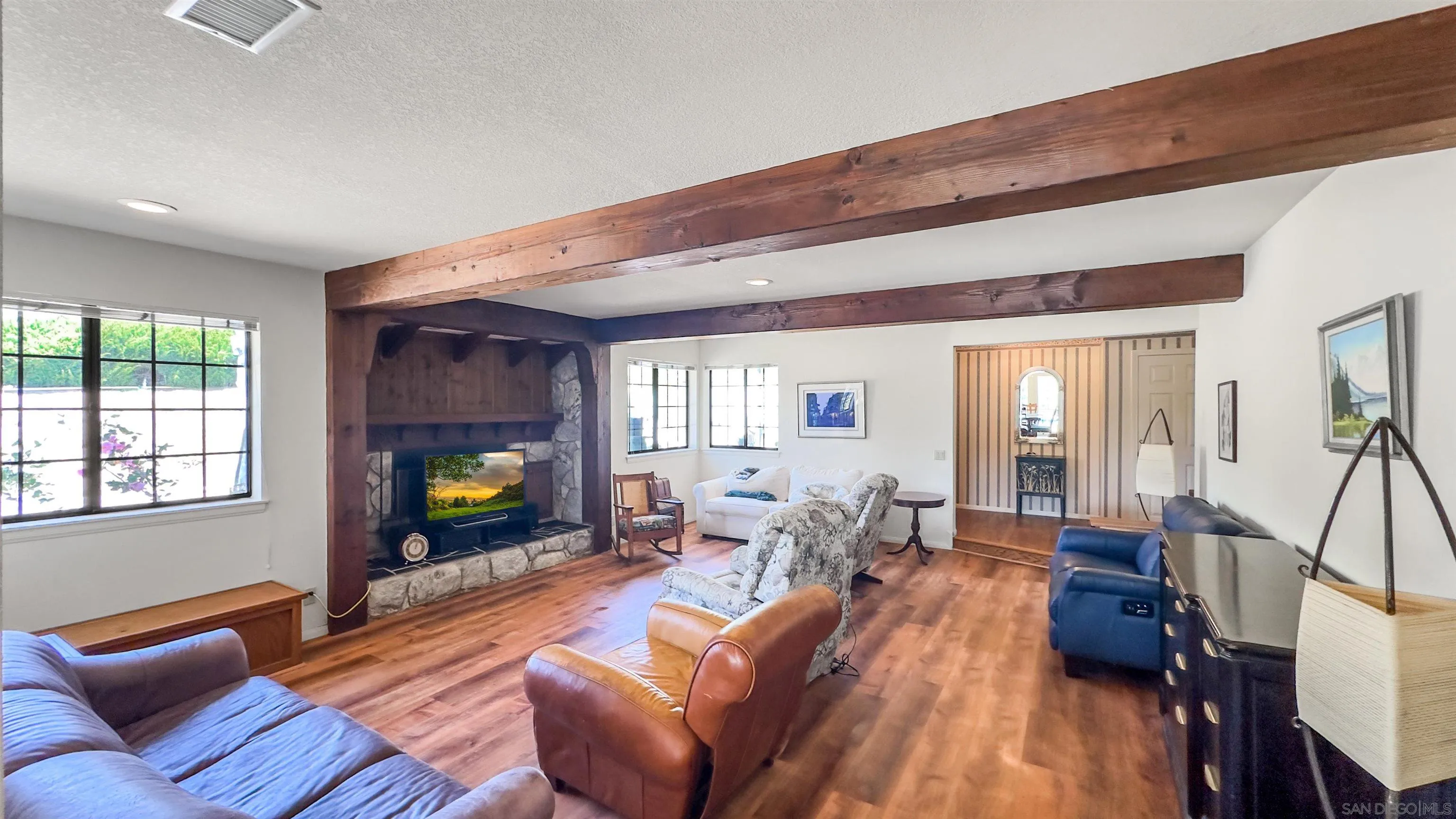 3675 Northcliff Drive Fallbrook, CA 92028 - Photo 4 of 37 a living room with furniture and a fireplace