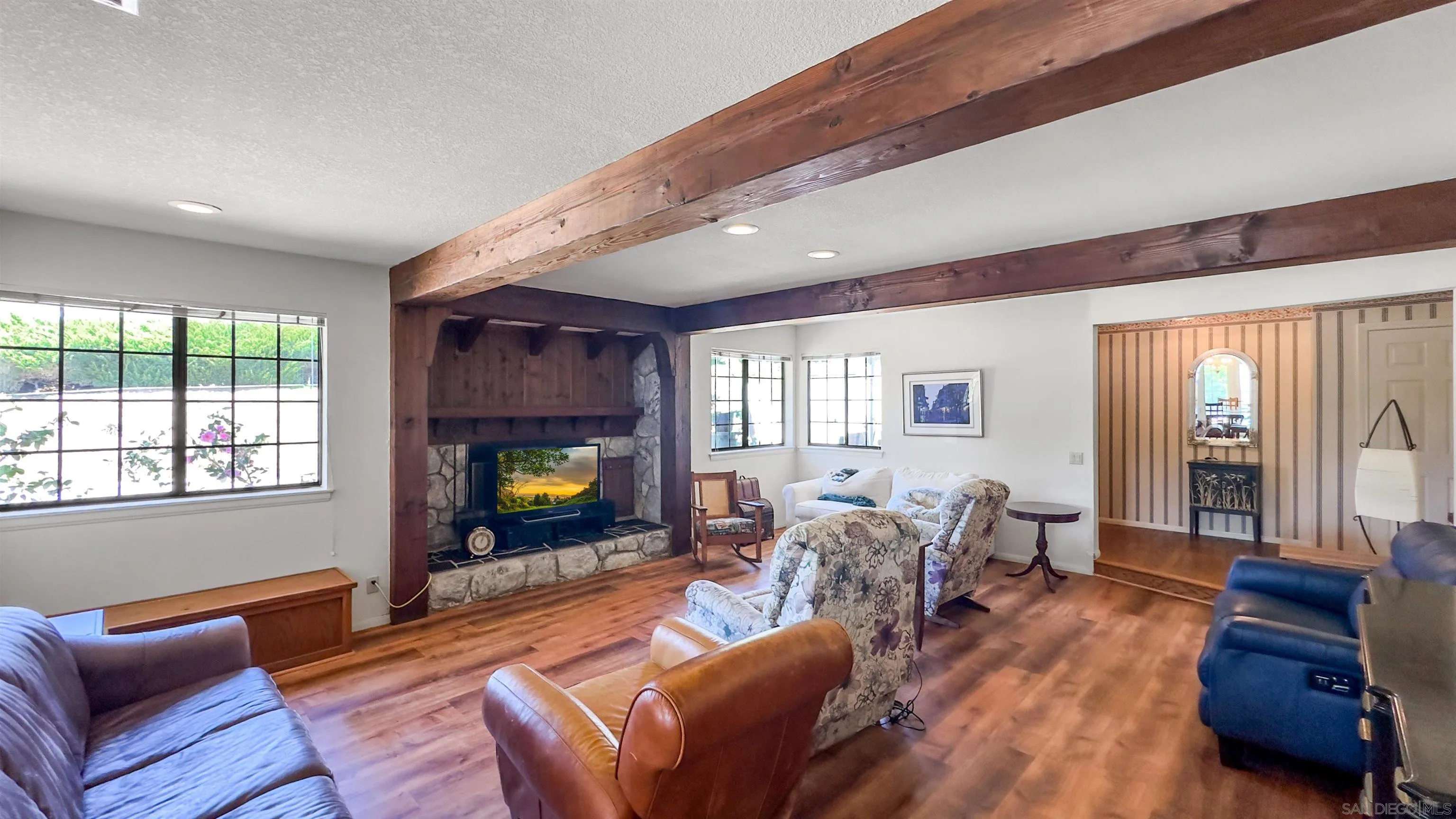 3675 Northcliff Drive Fallbrook, CA 92028 - Photo 7 of 37 a living room with furniture and a fireplace