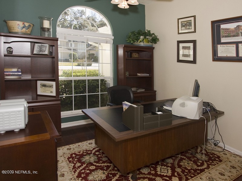 813 Mill Stream Road Ponte Vedra Beach, FL 32082 - Photo 17 of 22 a living room with furniture and a window