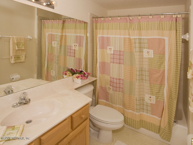 813 Mill Stream Road Ponte Vedra Beach, FL 32082 - Photo 22 of 22 a bathroom with a sink and a shower