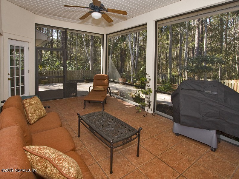 813 Mill Stream Road Ponte Vedra Beach, FL 32082 - Photo 4 of 22 a living room with furniture and a rug