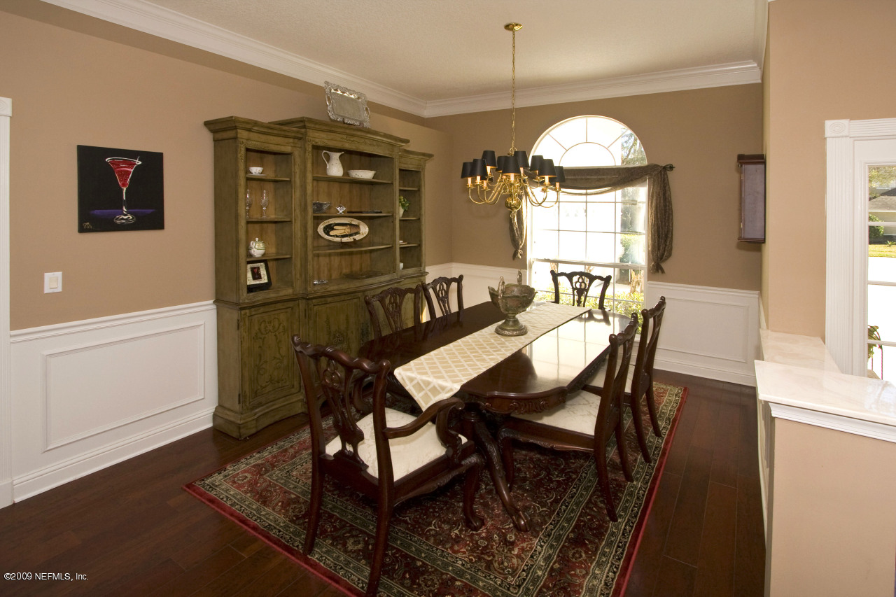 813 Mill Stream Road Ponte Vedra Beach, FL 32082 - Photo 5 of 22 a view of a dining room with furniture and window