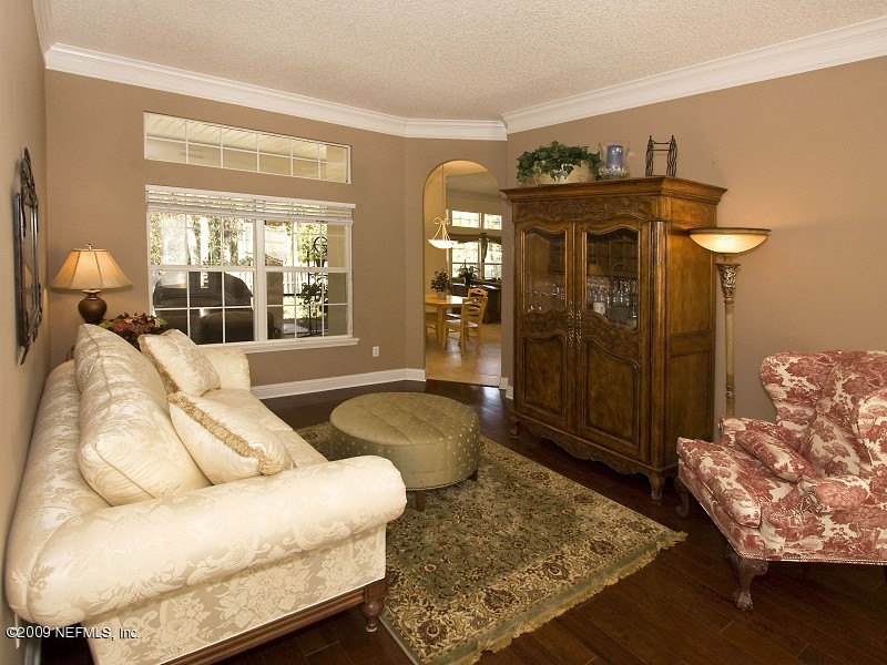 813 Mill Stream Road Ponte Vedra Beach, FL 32082 - Photo 6 of 22 a living room with furniture and a rug