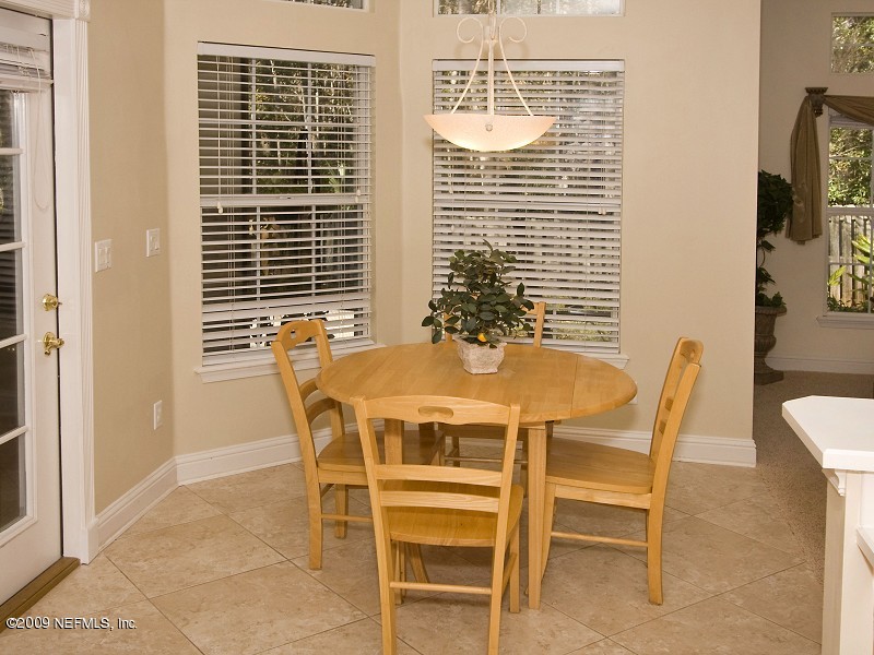 813 Mill Stream Road Ponte Vedra Beach, FL 32082 - Photo 10 of 22 a dining room with furniture and window