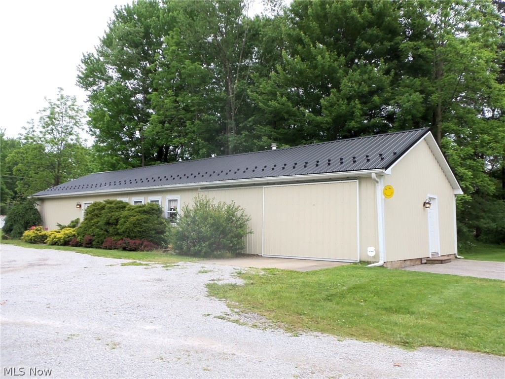 17506 Madison Road Middlefield, OH 44062 - Photo 27 of 35 24x72 Shop with plenty of parking area and overhead doors for vechicles