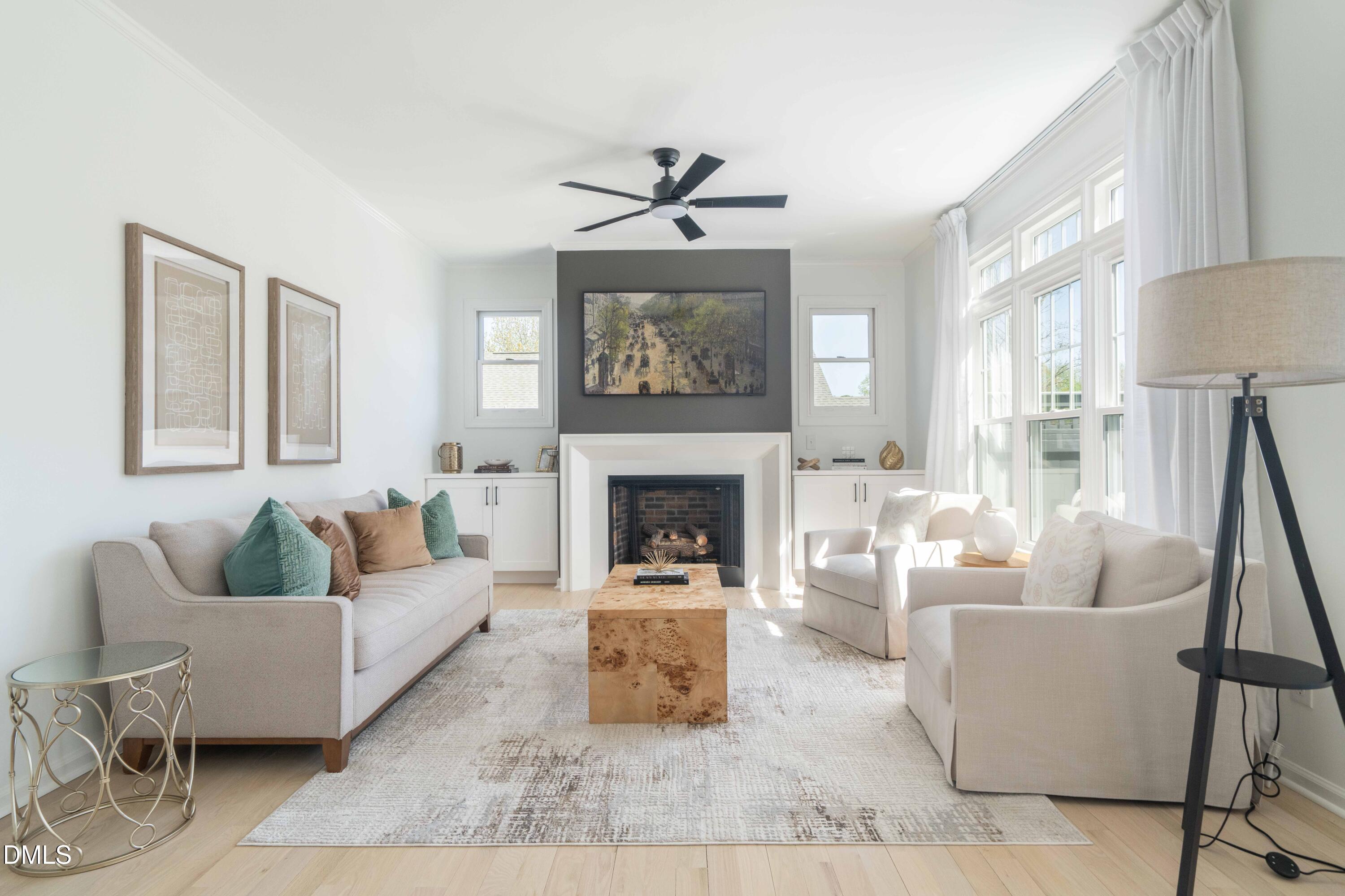 1512 Cooper Falls Lane Raleigh, NC 27614 - Photo 21 of 64 a living room with furniture and a fireplace